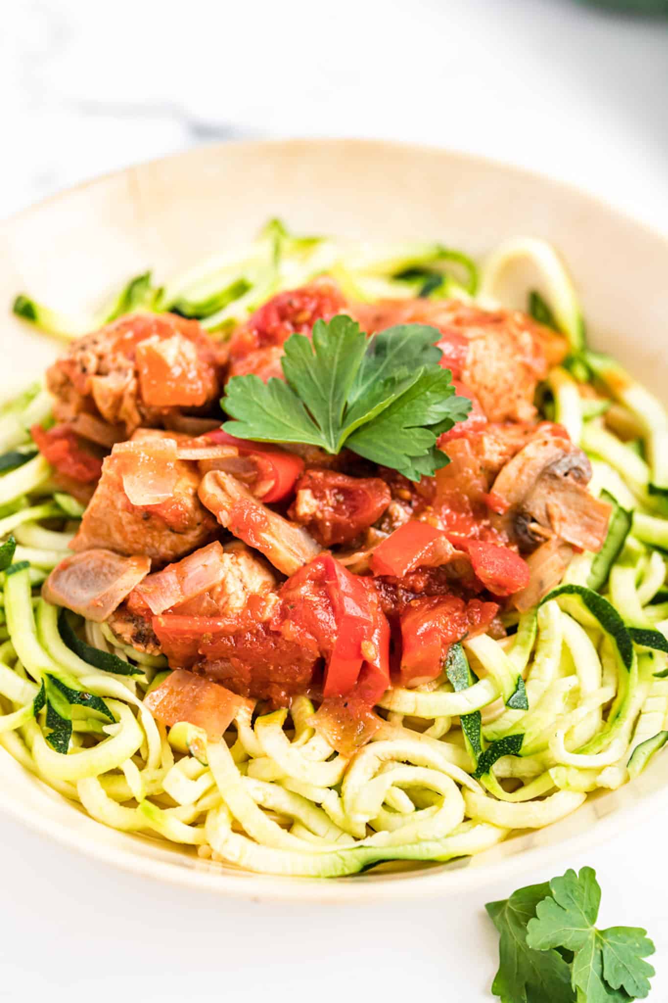 low-carb chicken cacciatore served with zucchini noodles.
