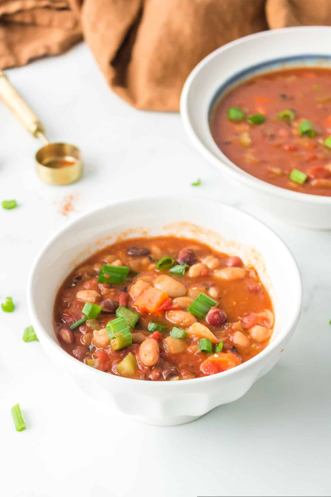 two bowls of cooked instant pot 15 bean soup