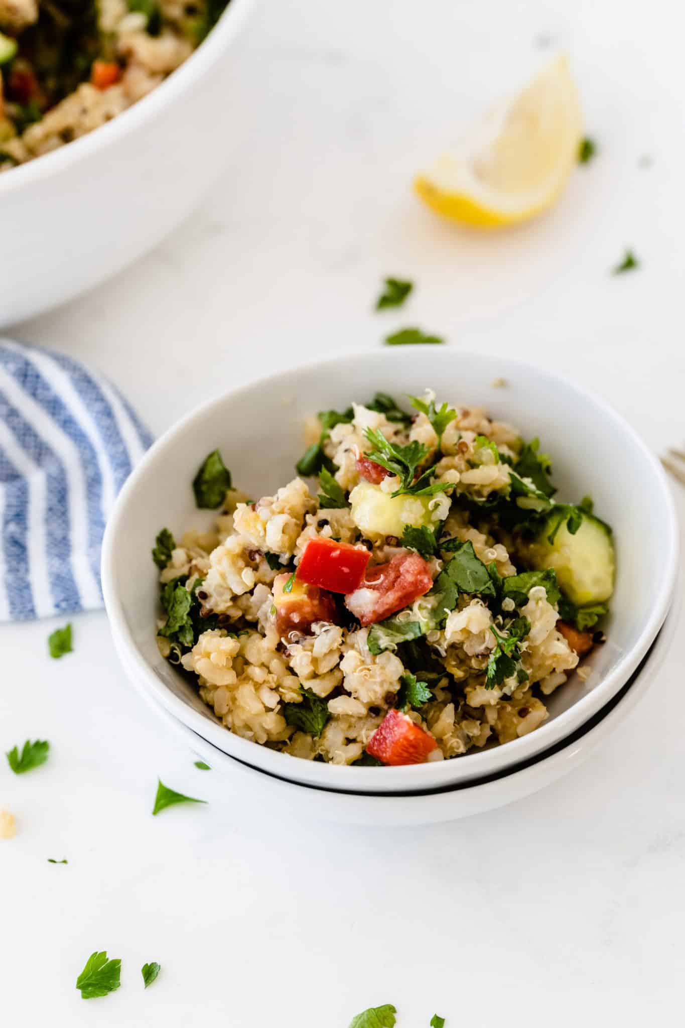 bowl of quinoa salad with fresh lemon