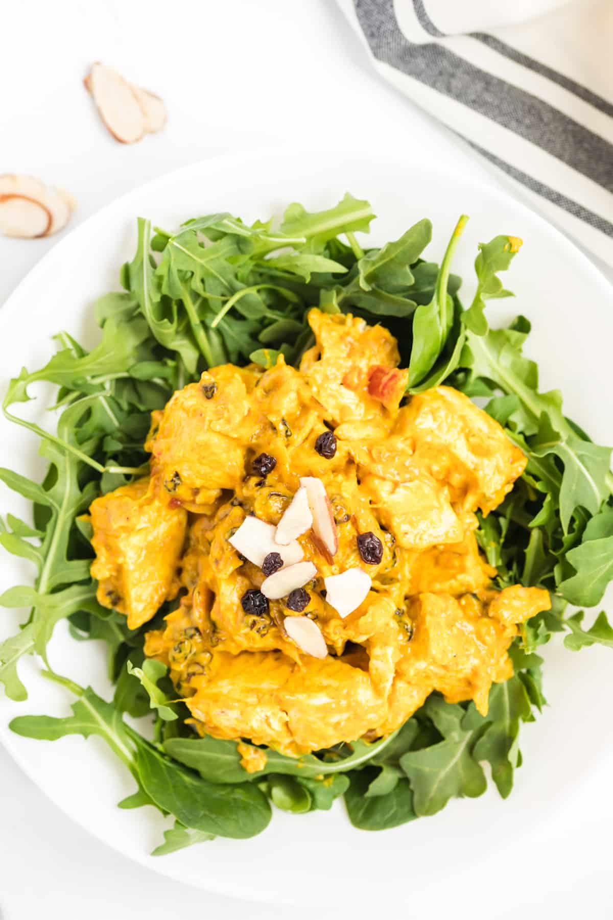 Chicken salad on a bed of arugula