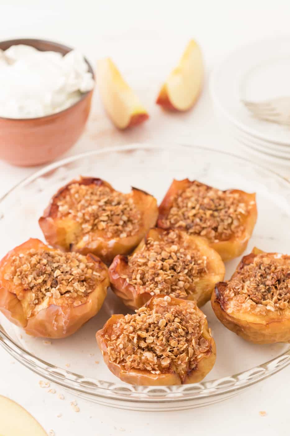 Air fryer baked apples with oat filling on a plate.