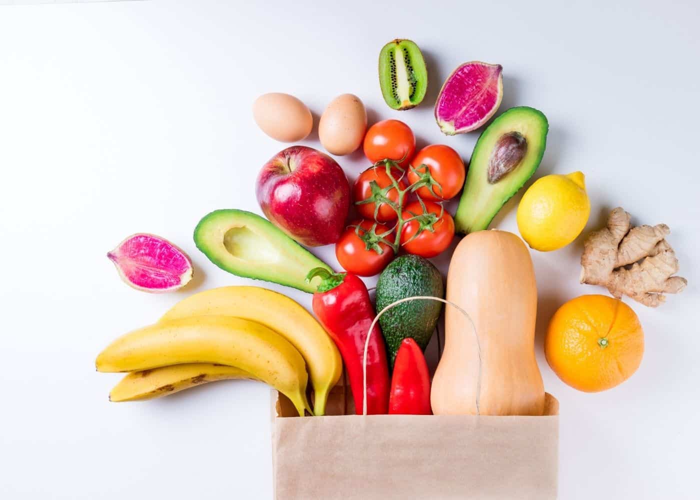 grocery bag filled with healthy foods