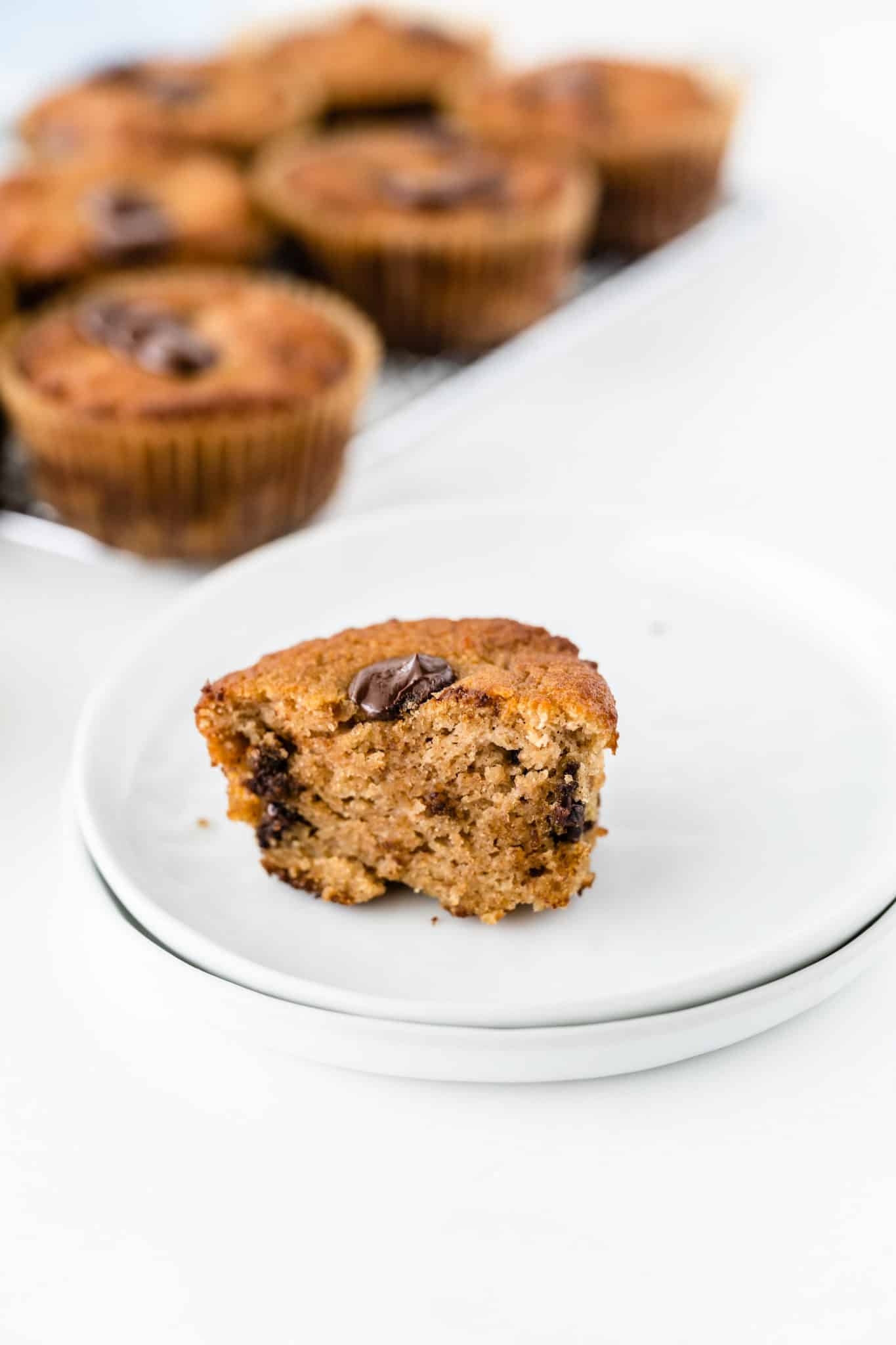 coconut flour chocolate chip muffin with a bite taken out of it