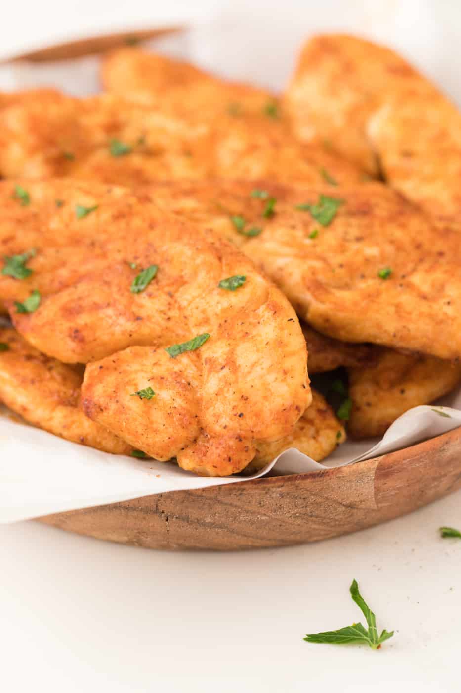 cooked chicken tenders on a serving dish