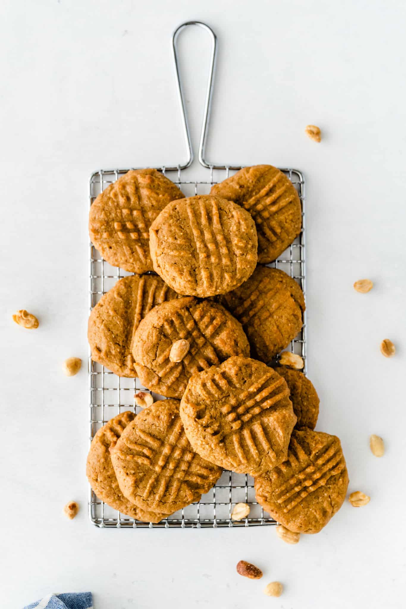 A cooling rack covered in cookies