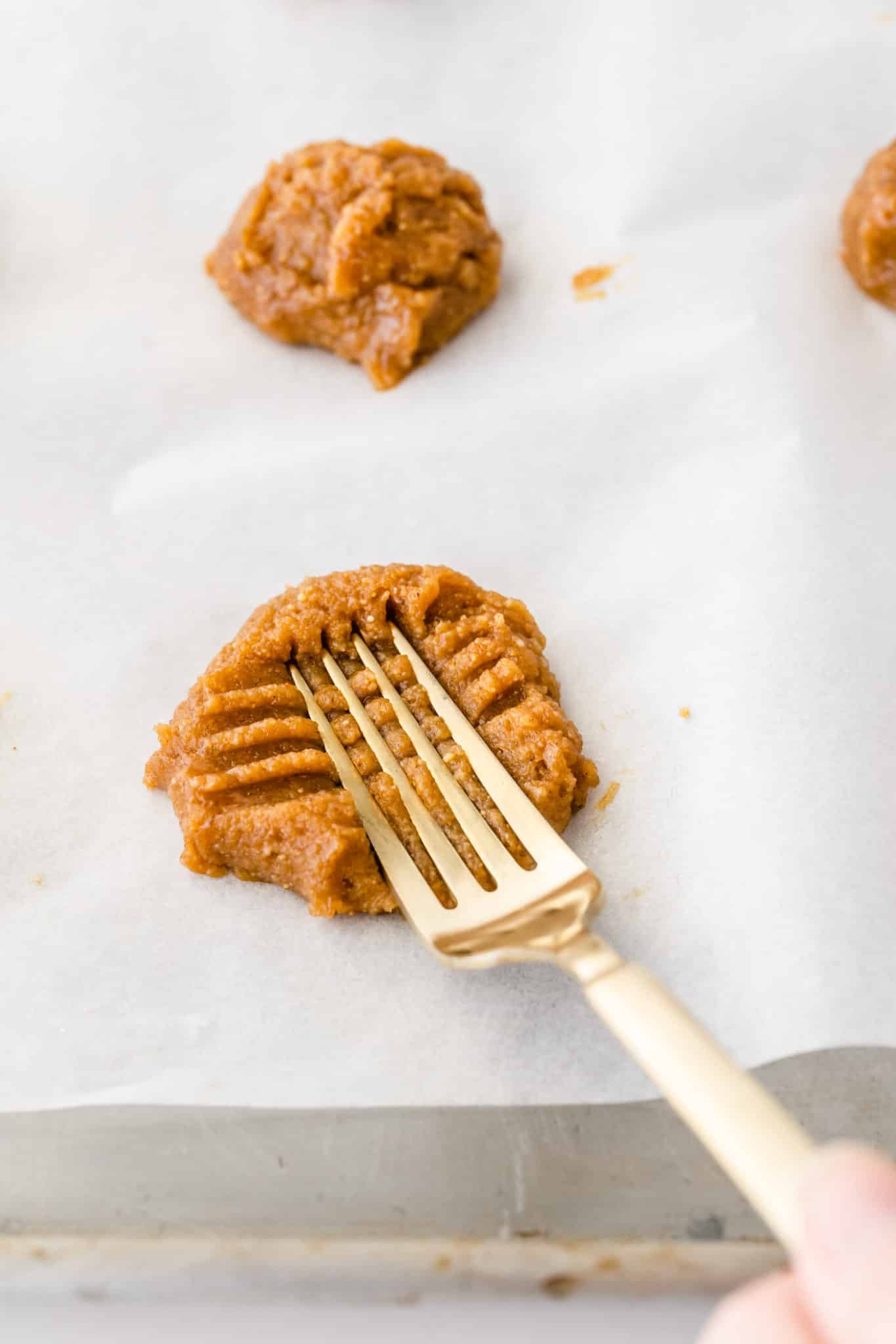peanut butter cookies criss cross with a fork