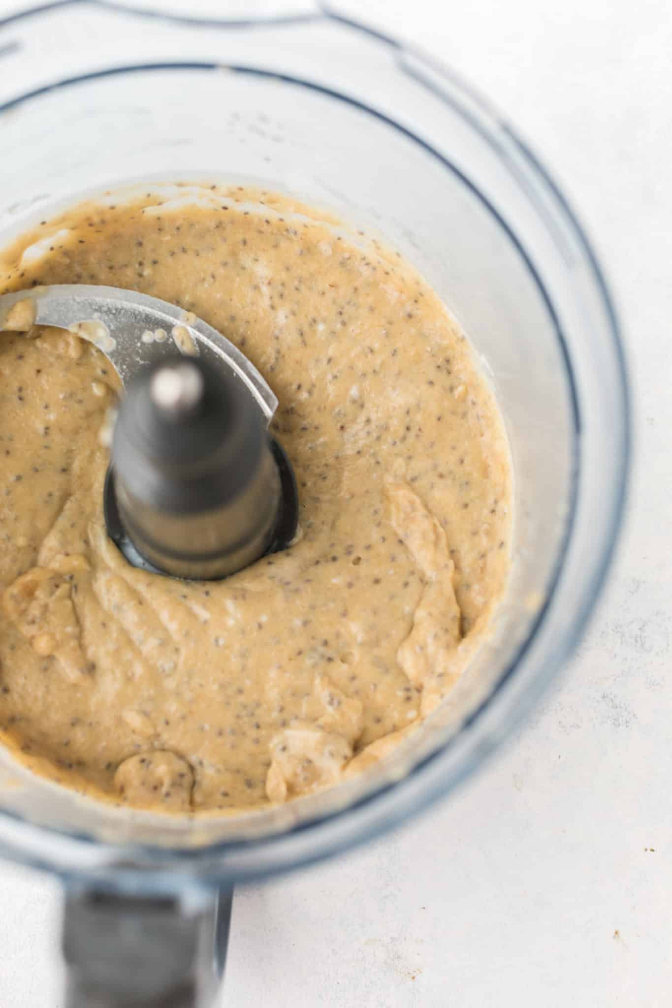 making the dairy-free banana bread batter in food processor.