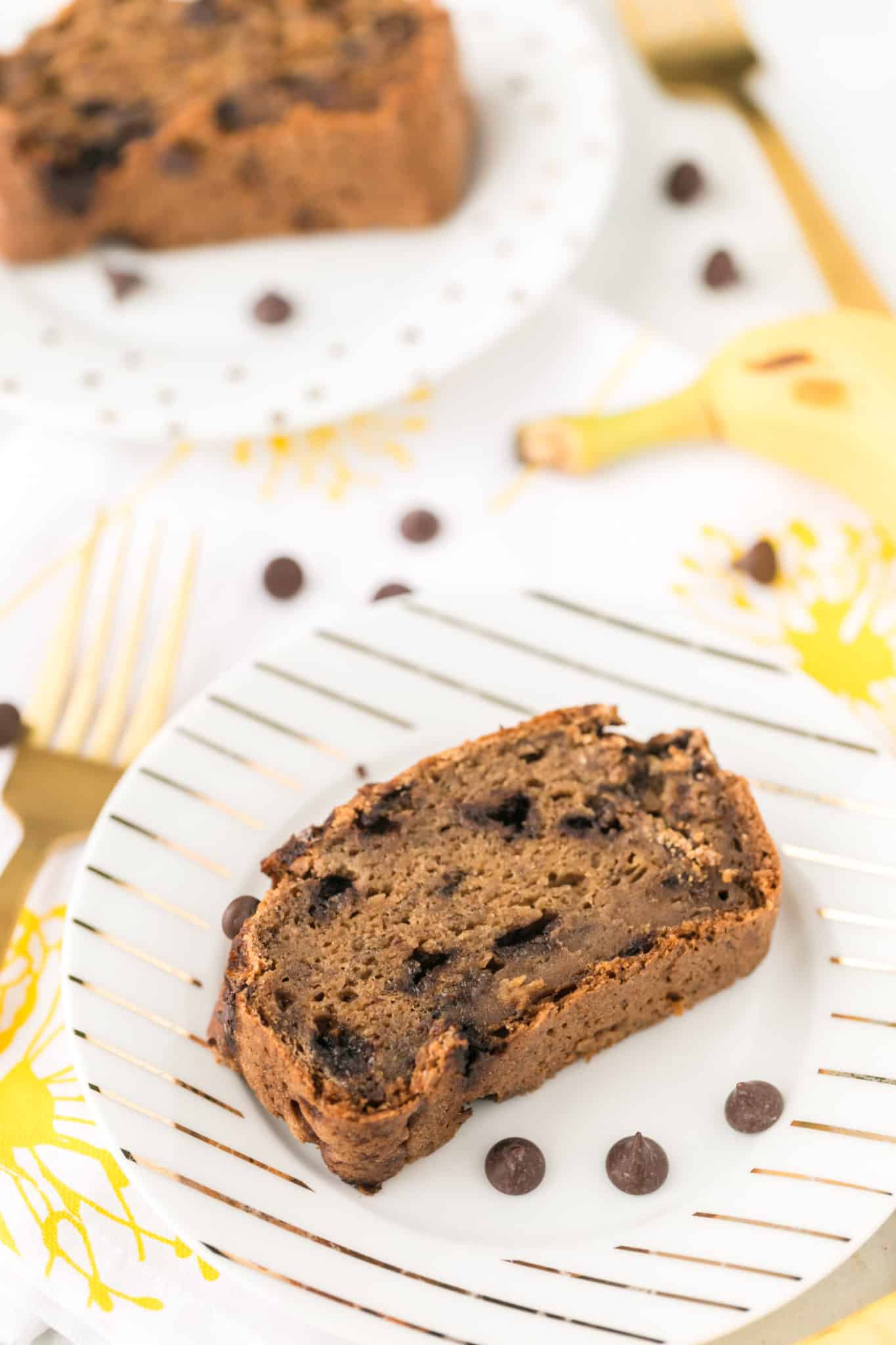 two plates of baked dairy-free banana bread with chocolate chips.