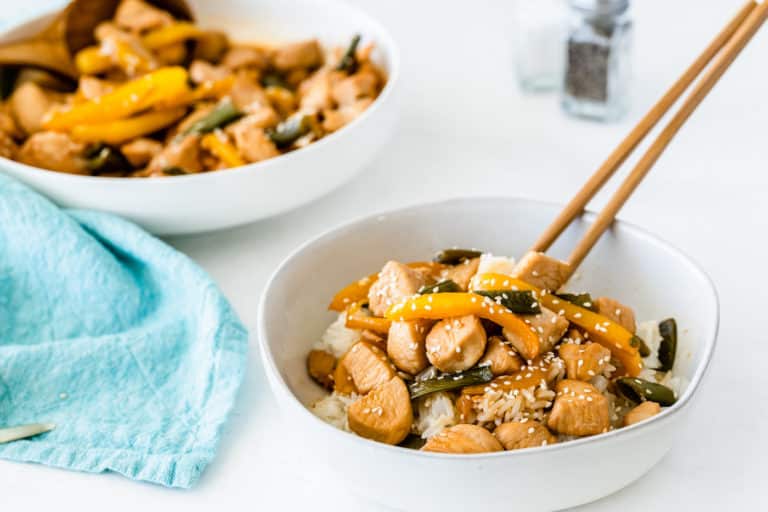 A bowl of honey sesame chicken