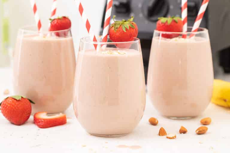 Strawberry smoothies with straws
