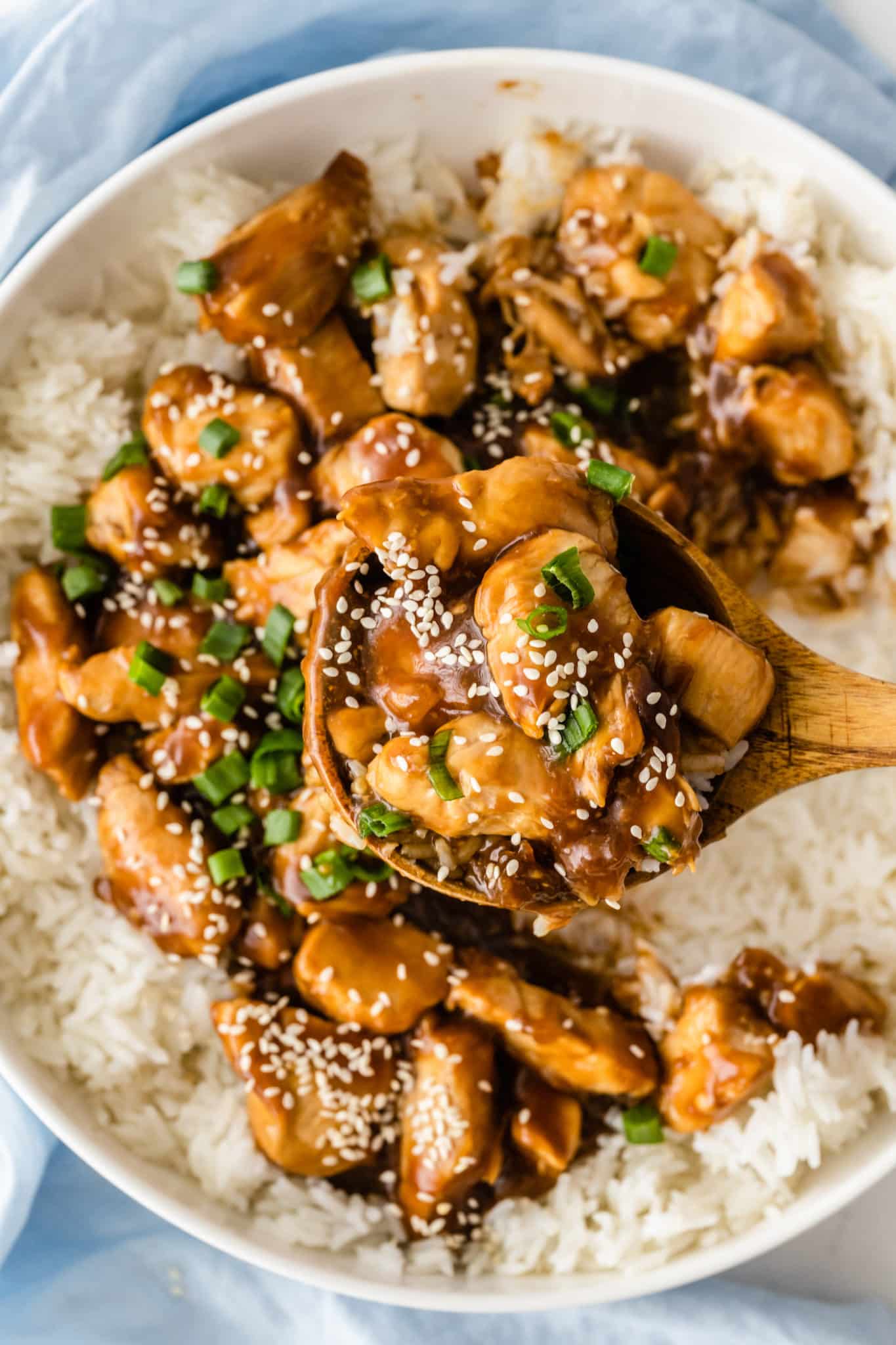 teriyaki chicken served in a bowl over steamed rice