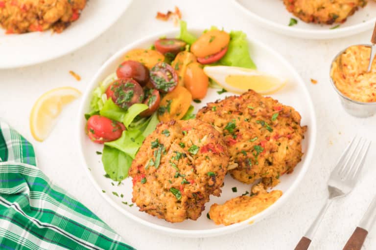 crab cakes with tomato salad