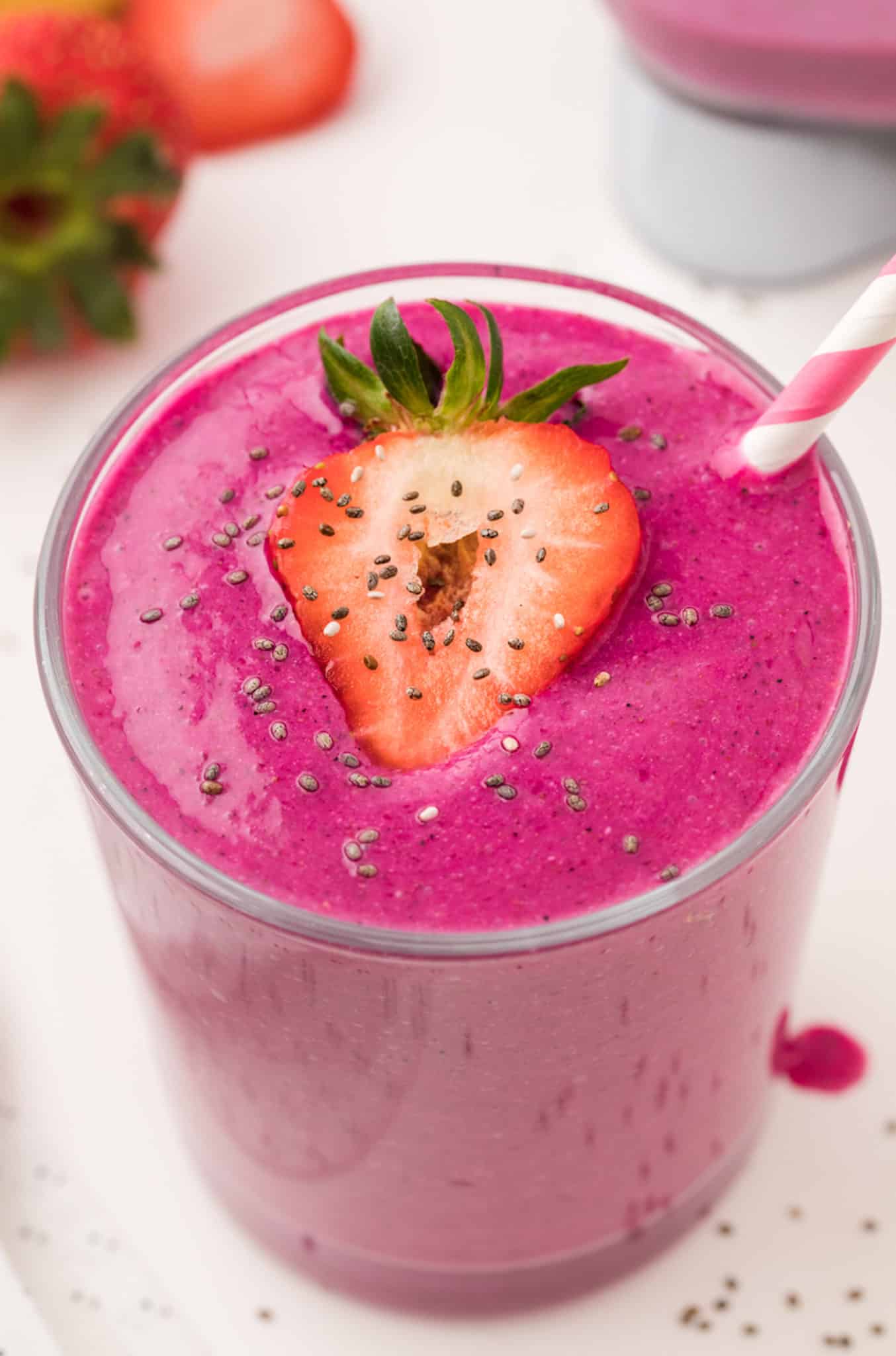 purple dragon fruit banana smoothie served in a glass