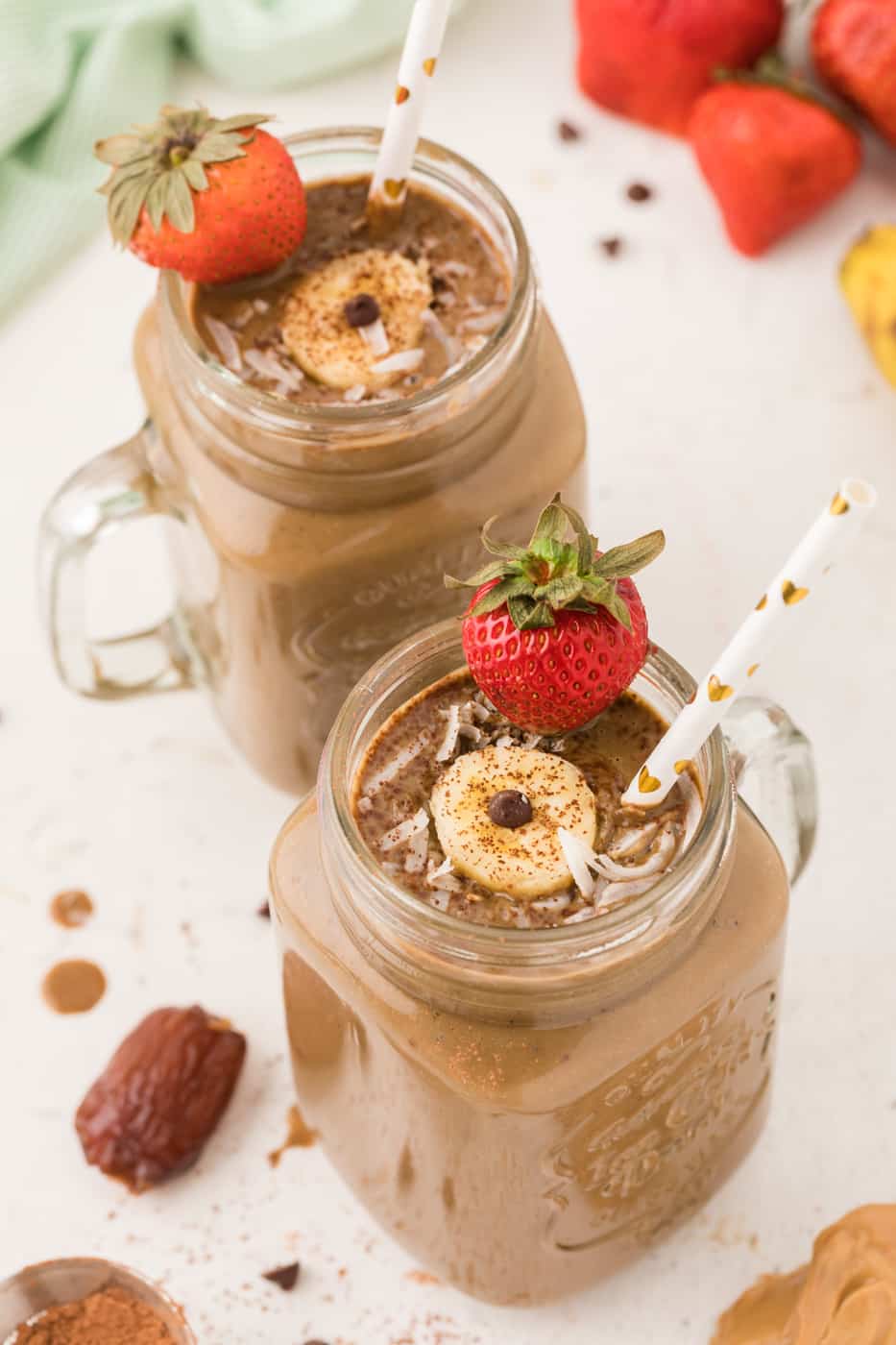 chocolate weight gain smoothie served in two jars.