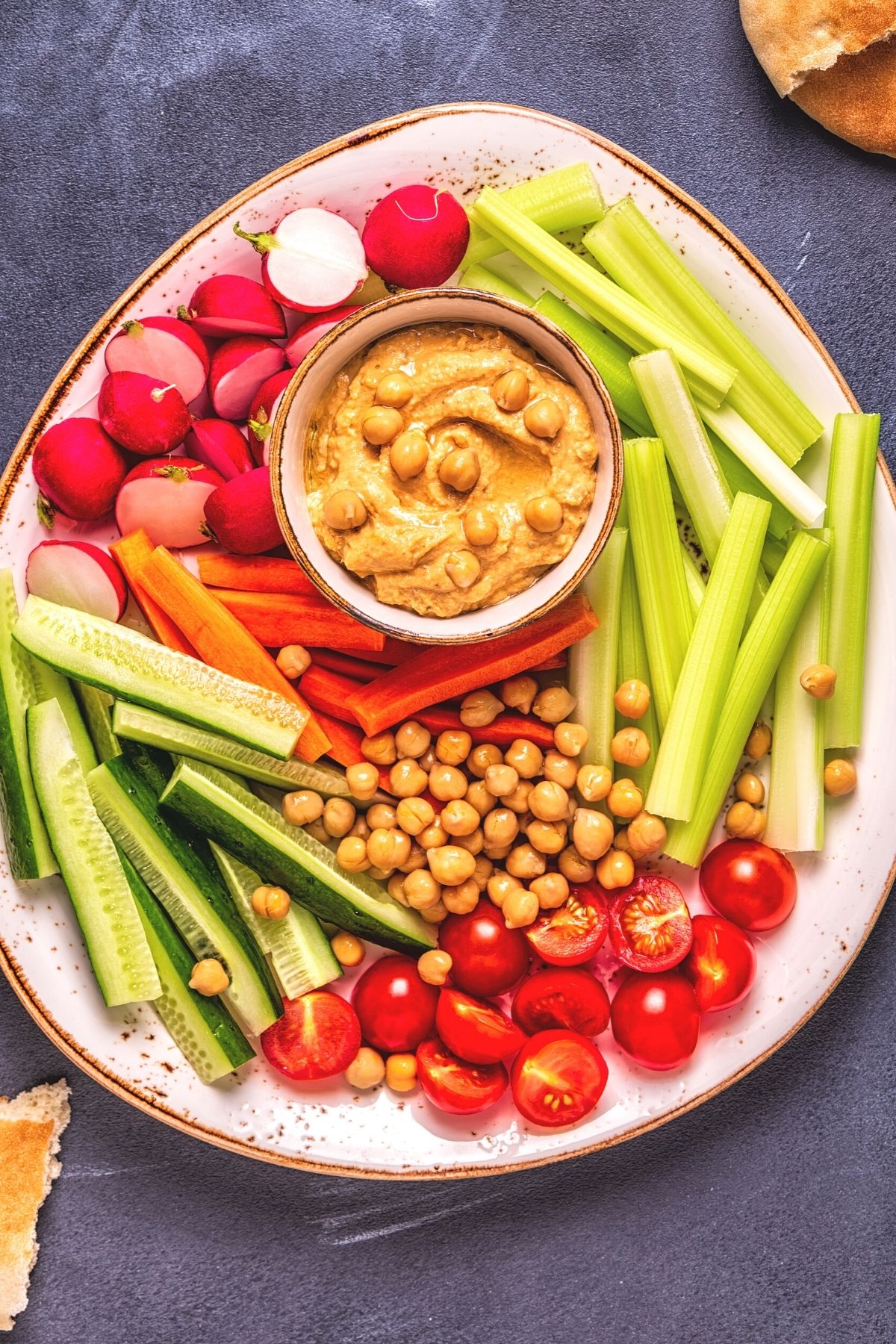 photo with platter of hummus and veggies