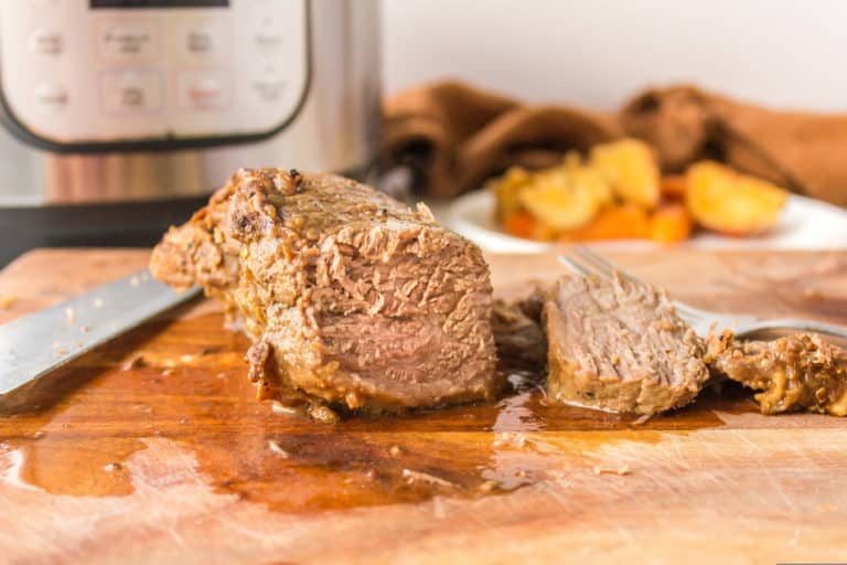 sliced tri tip on a cutting board