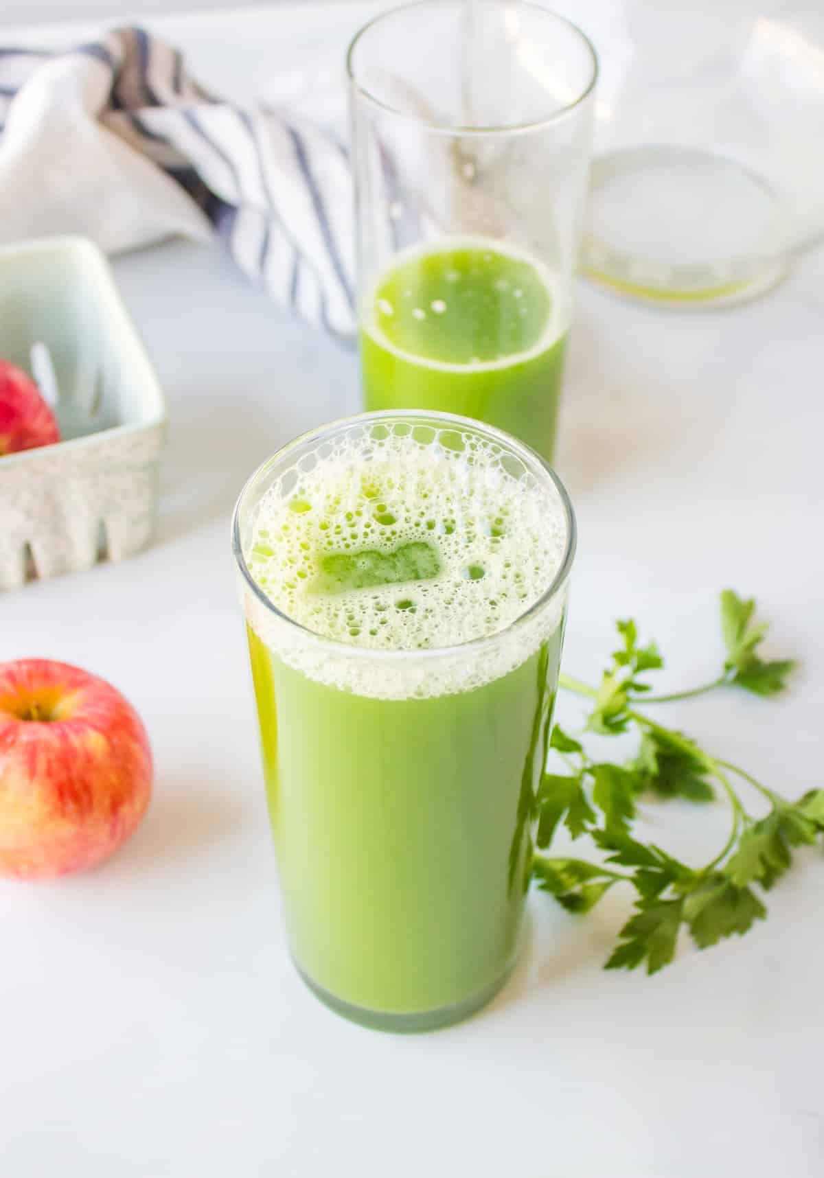 parsley juice served in pretty glass.