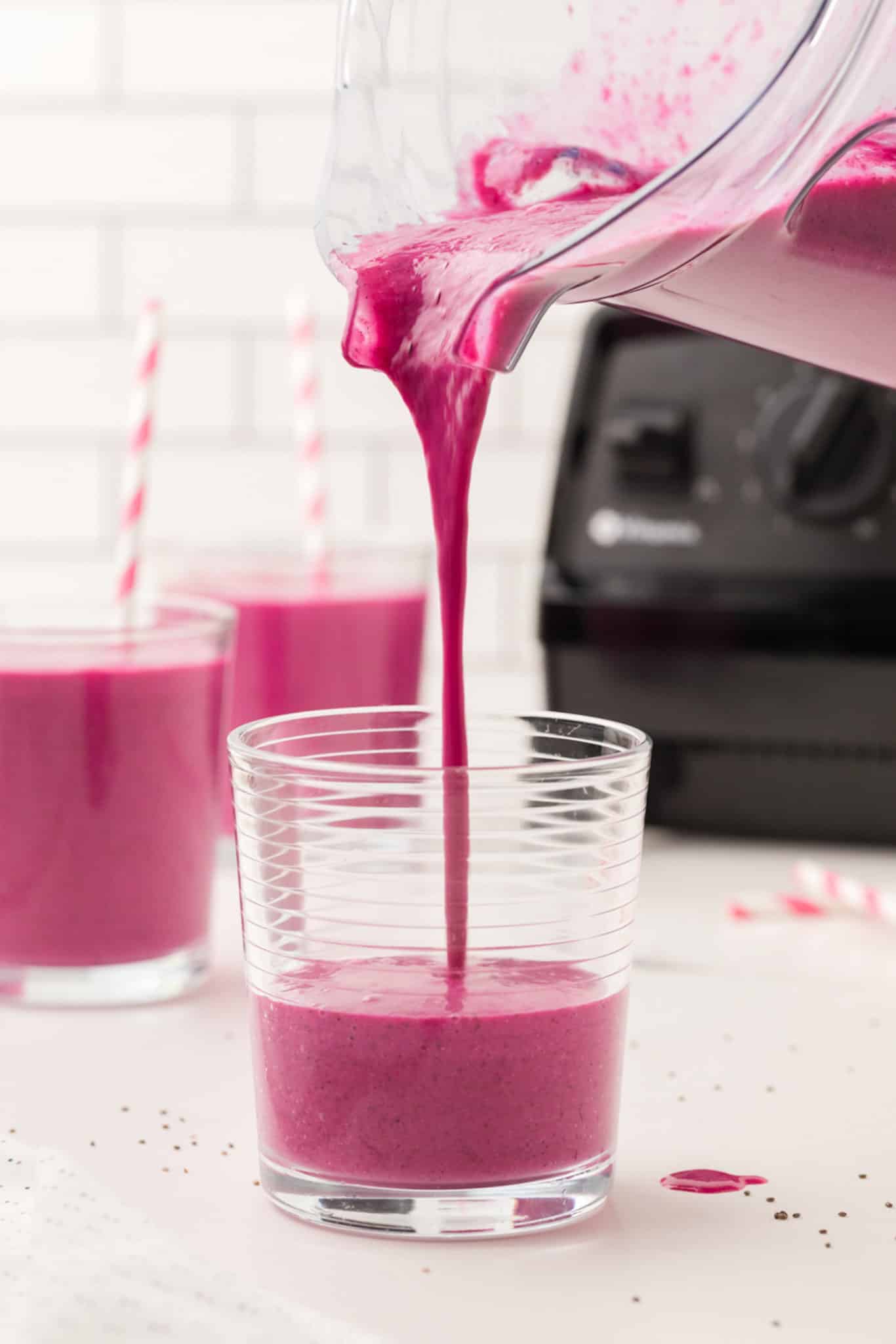 photo showing the smoothie being poured into a glass.