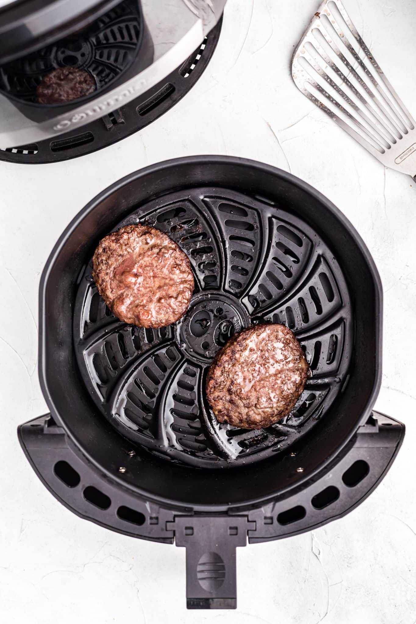 cooked hamburgers in an air fryer.