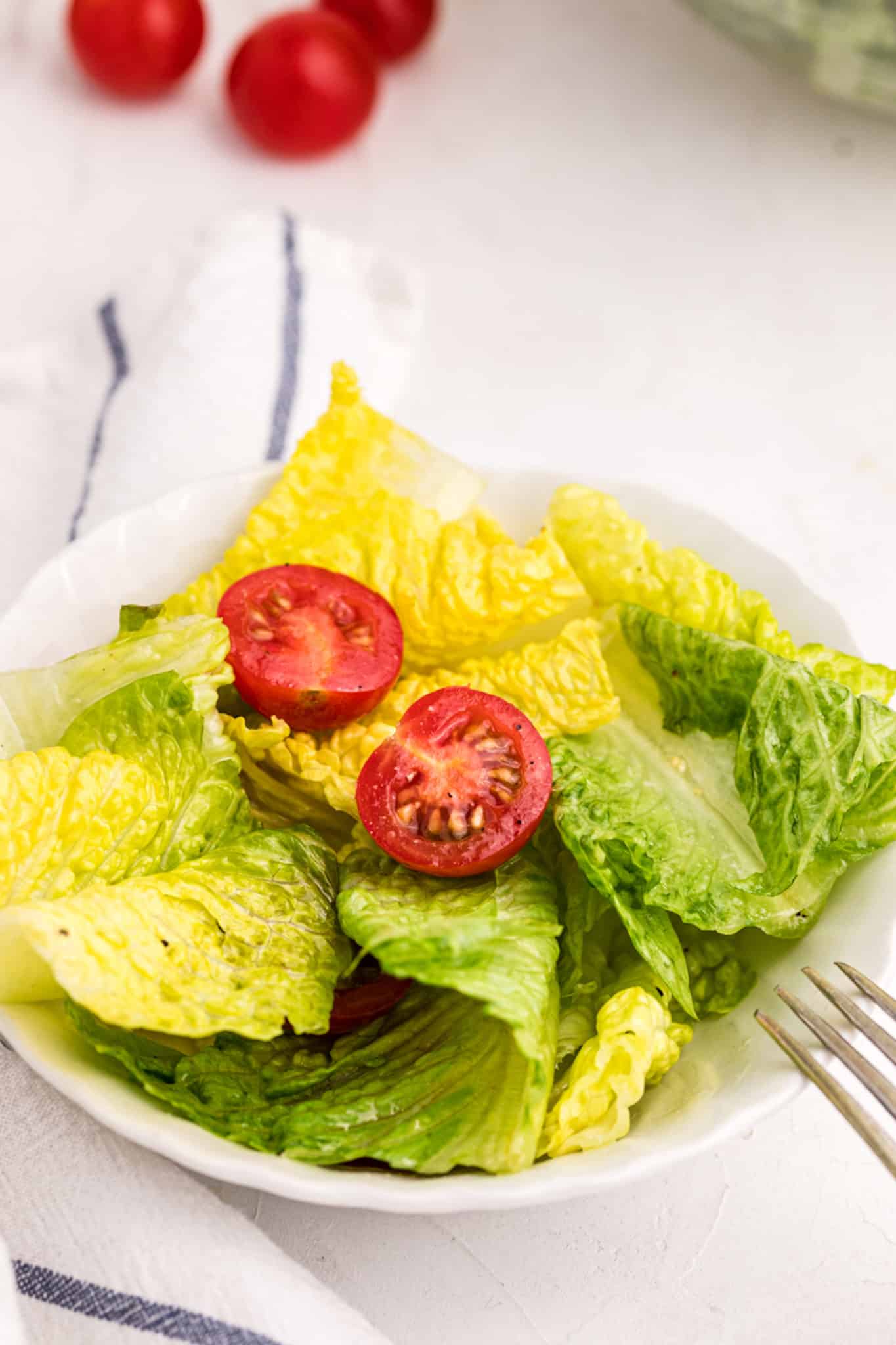 romaine salad with cherry tomatoes.