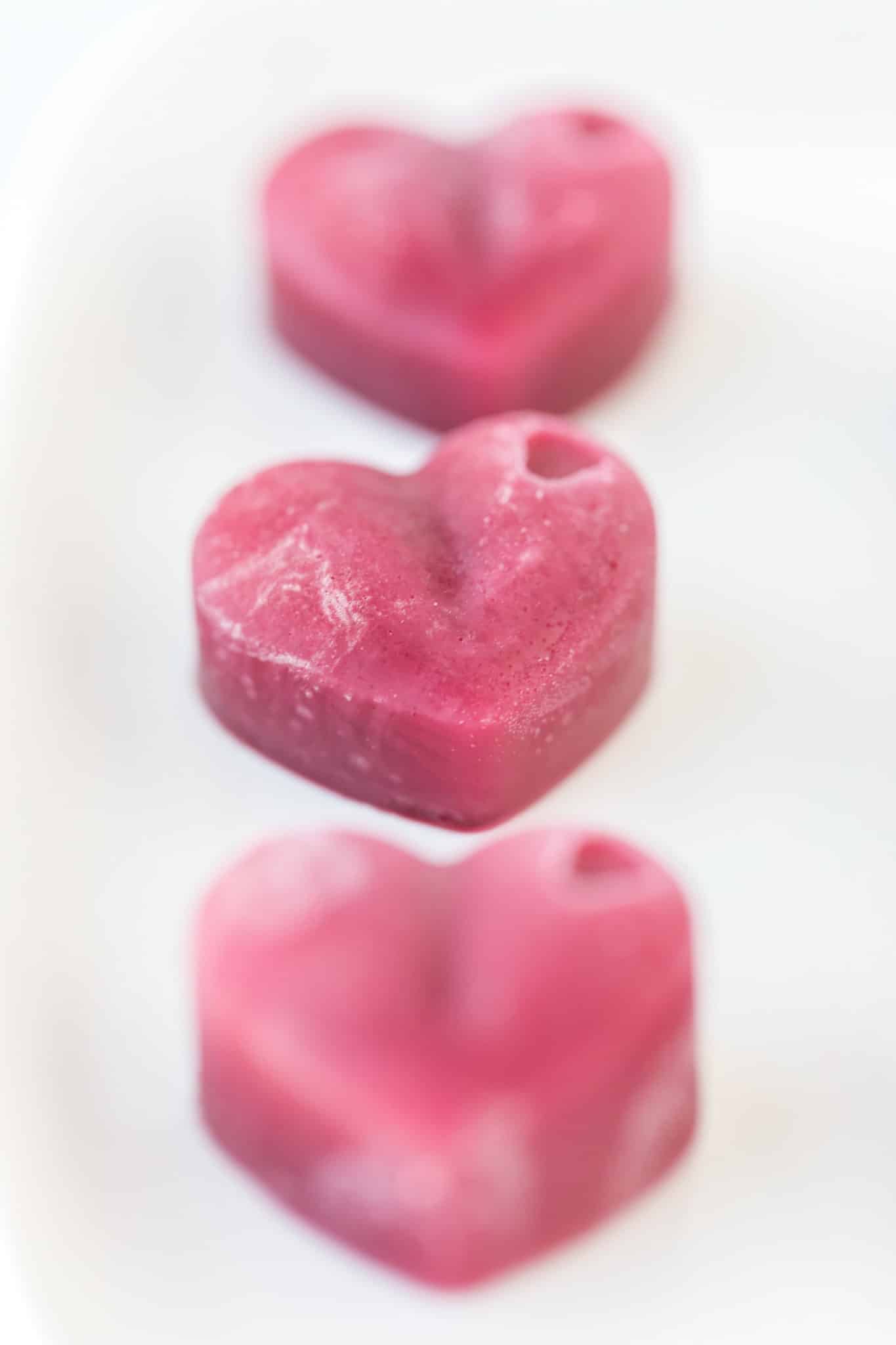 pink heart gummies on a plate