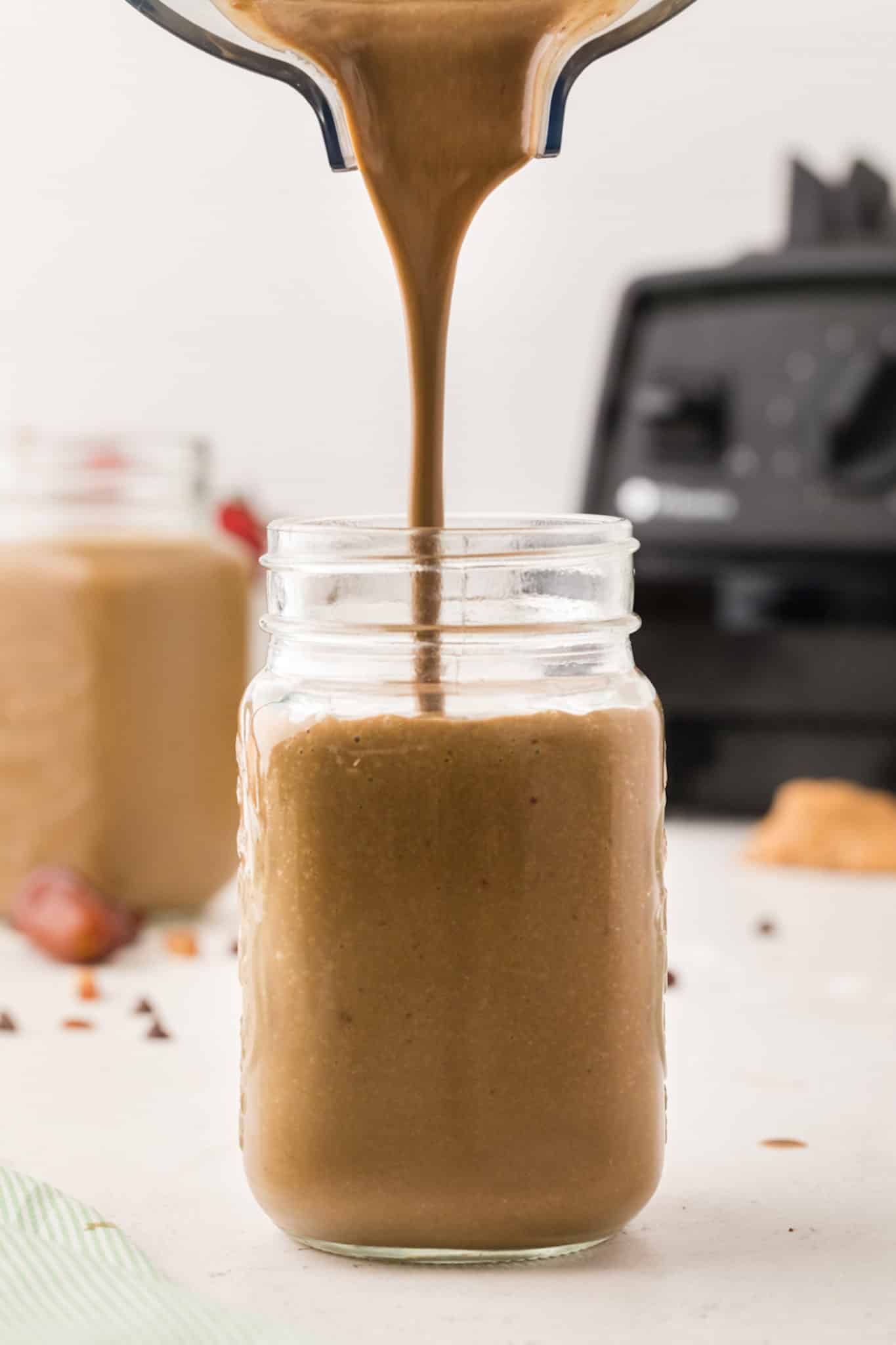 pour shot of smoothie into glass.