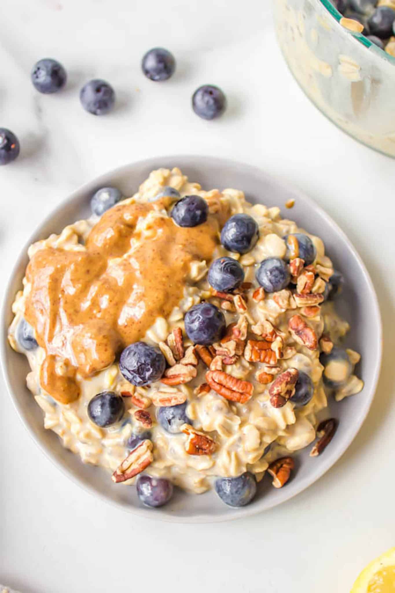 overnight protein oats with blueberries and nut butter.