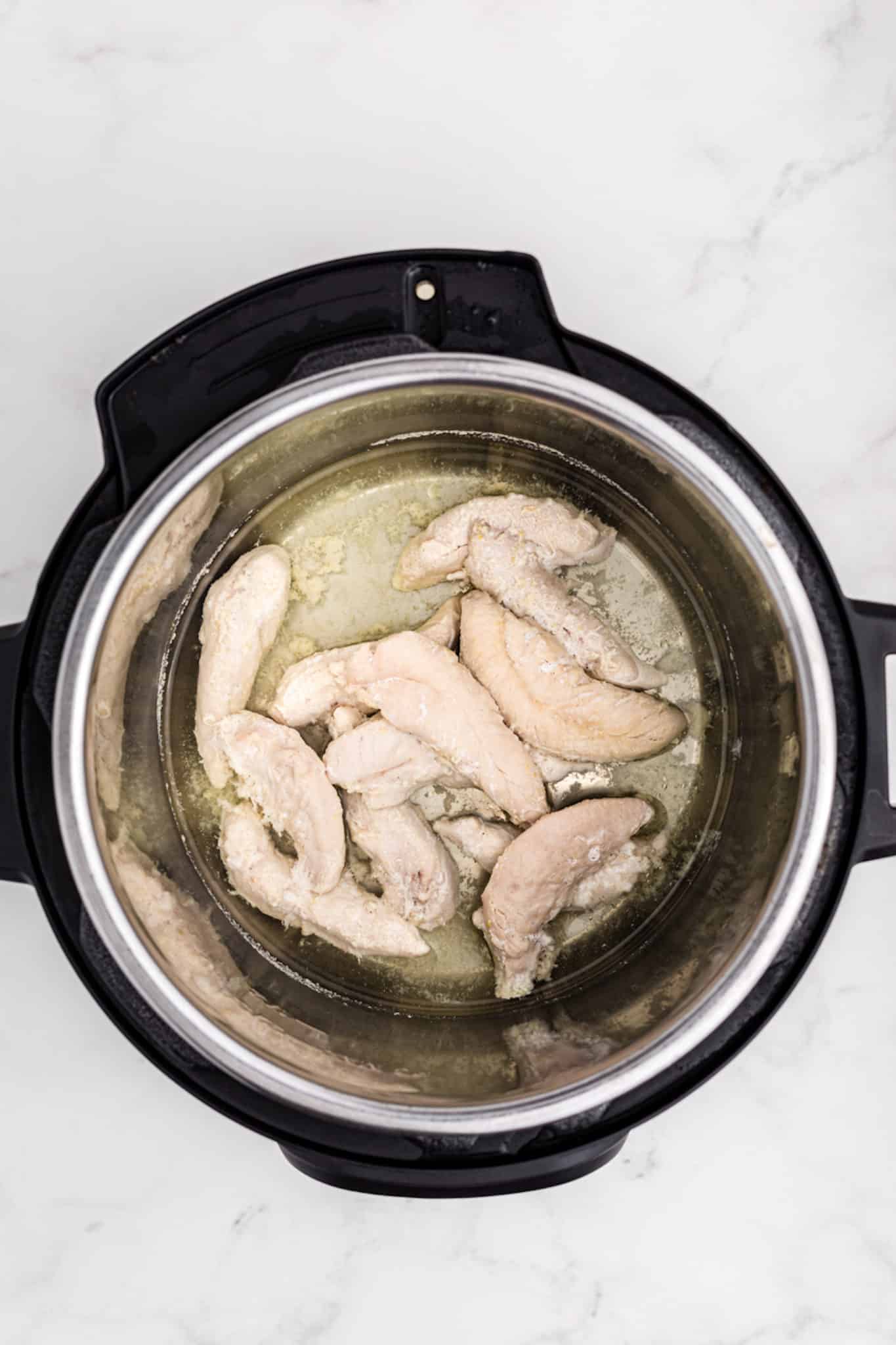 cooked chicken in an instant pot