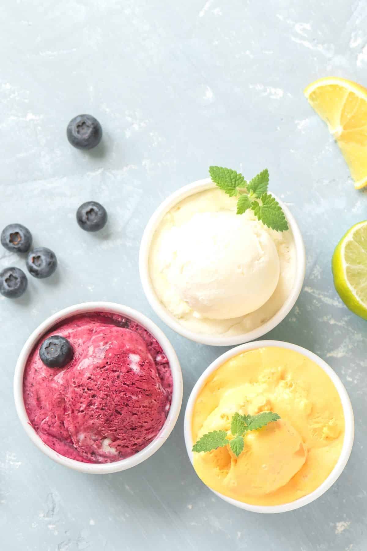 variety of colorful vitamix fruit sorbets in bowls.