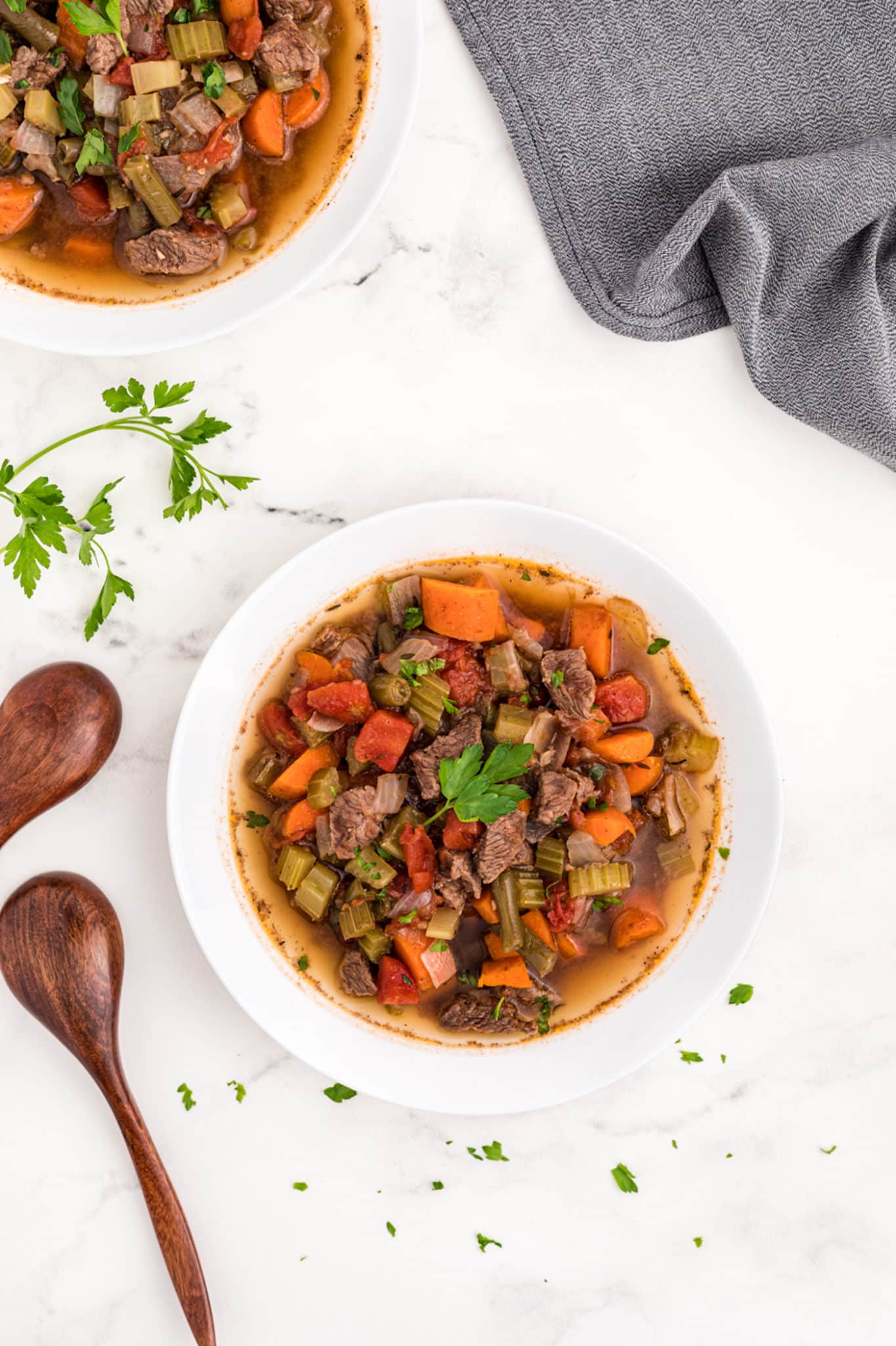 two bowls of instant pot beef stew.