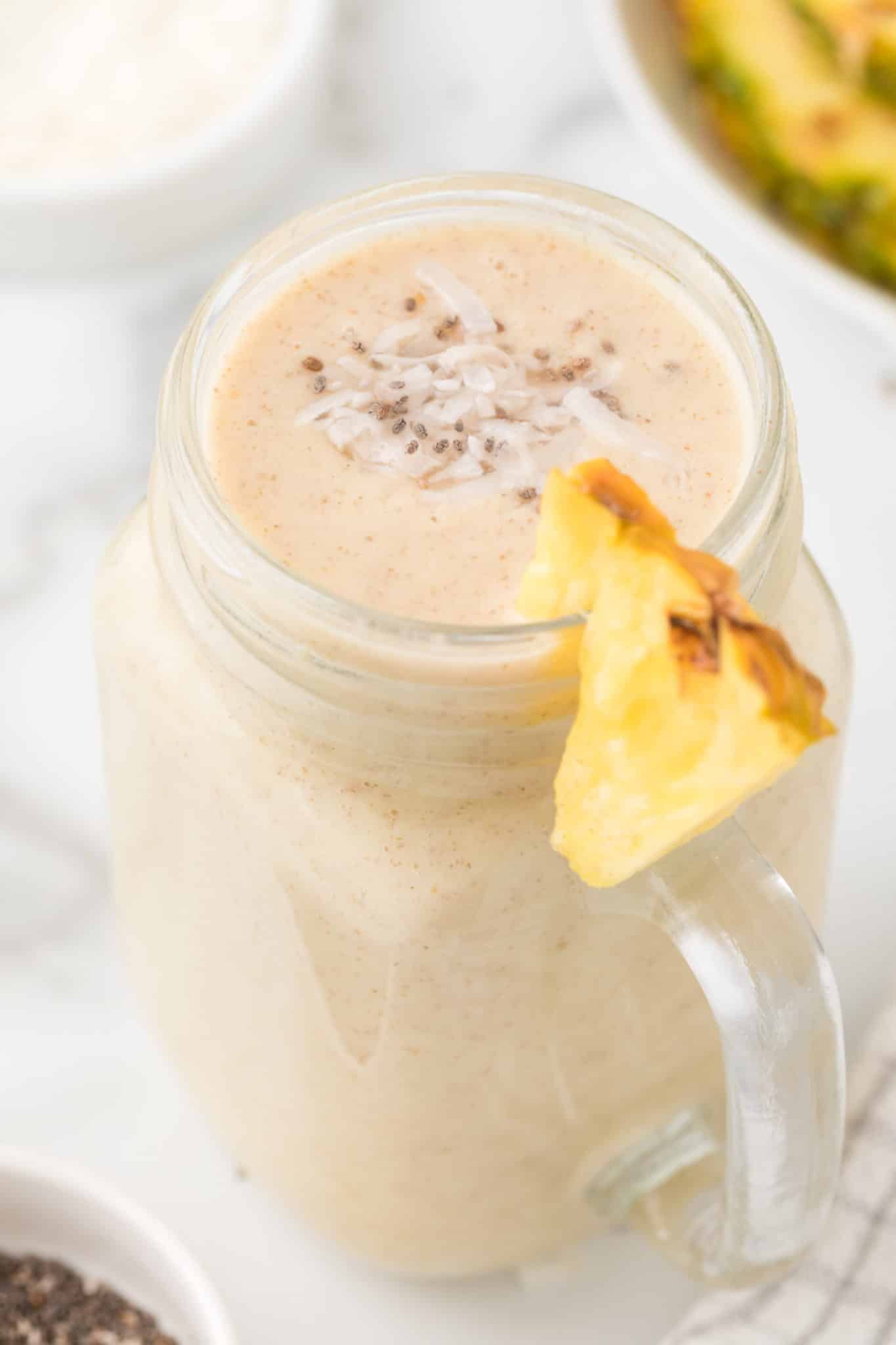 pineapple banana smoothie  served in a glass