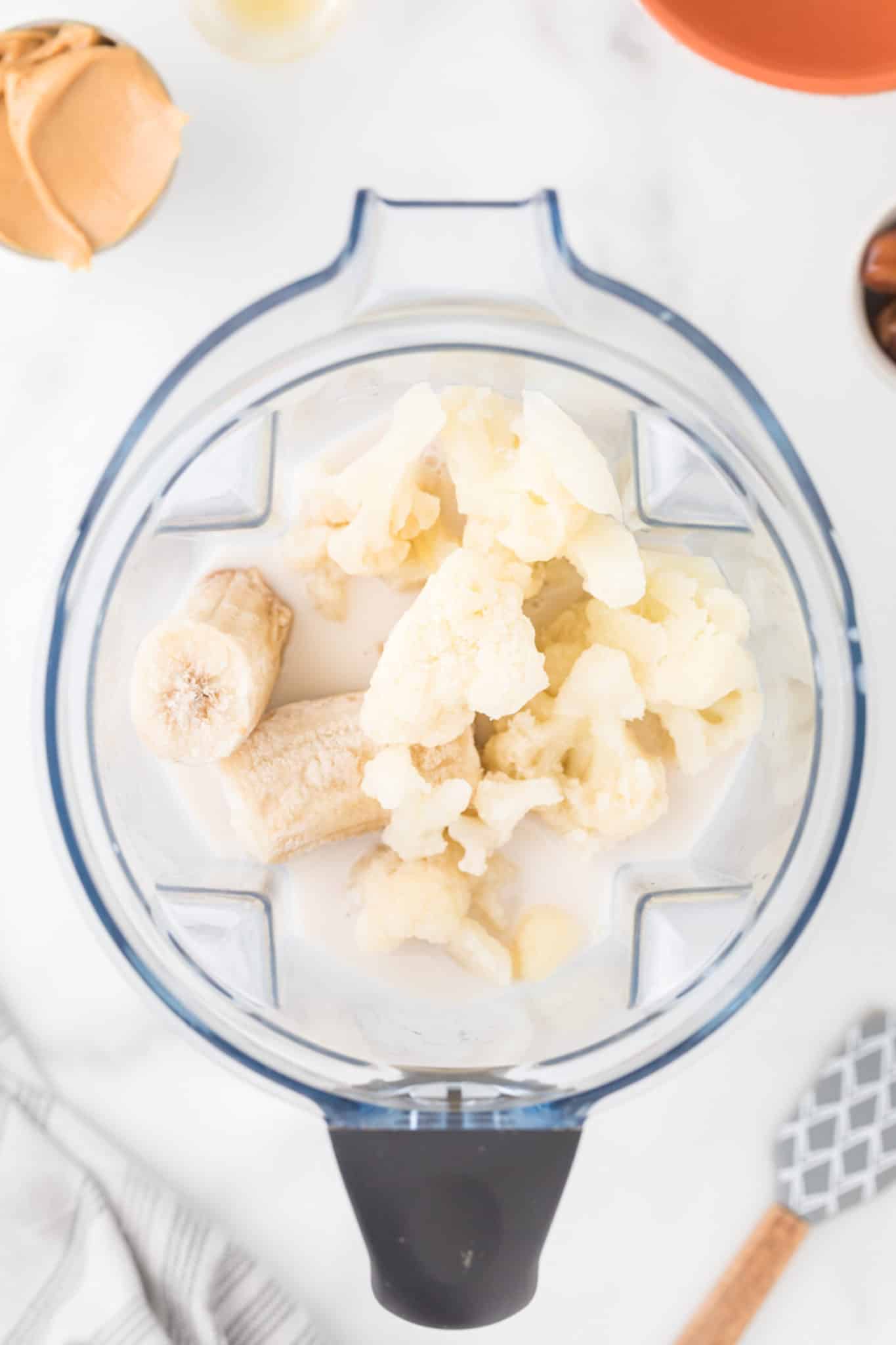 frozen cauliflower and banana in a blender