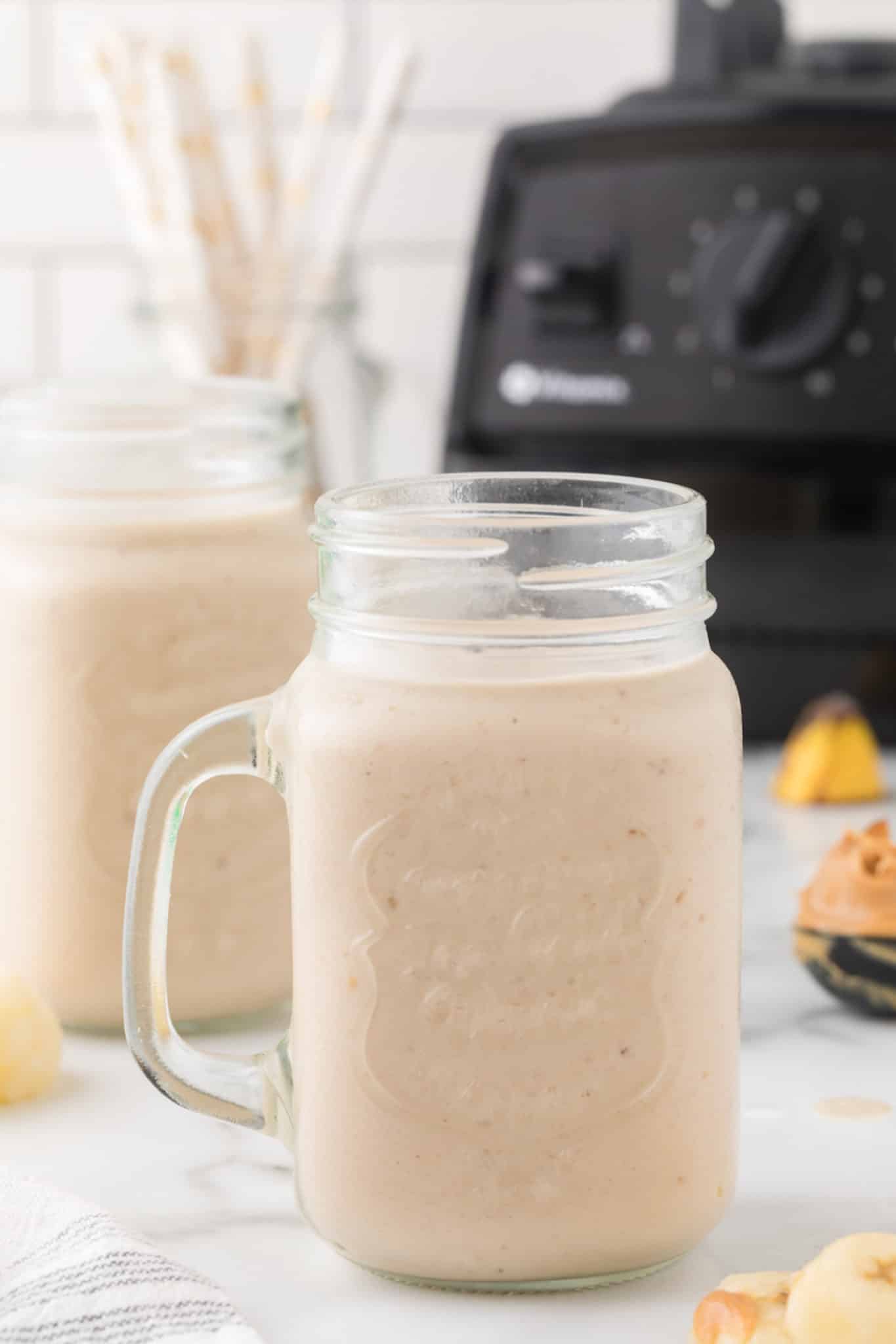 two glasses of smoothie on a table