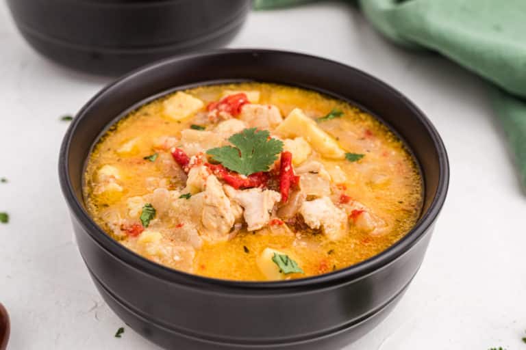 sweet potato chicken curry in a black bowl