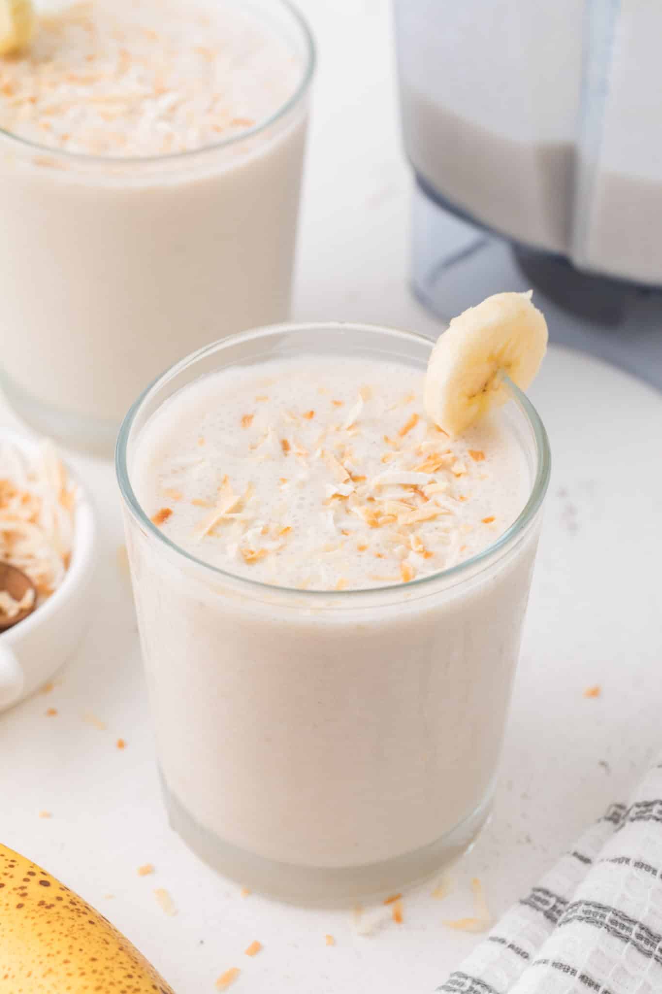 two glasses of creamy coconut shake.
