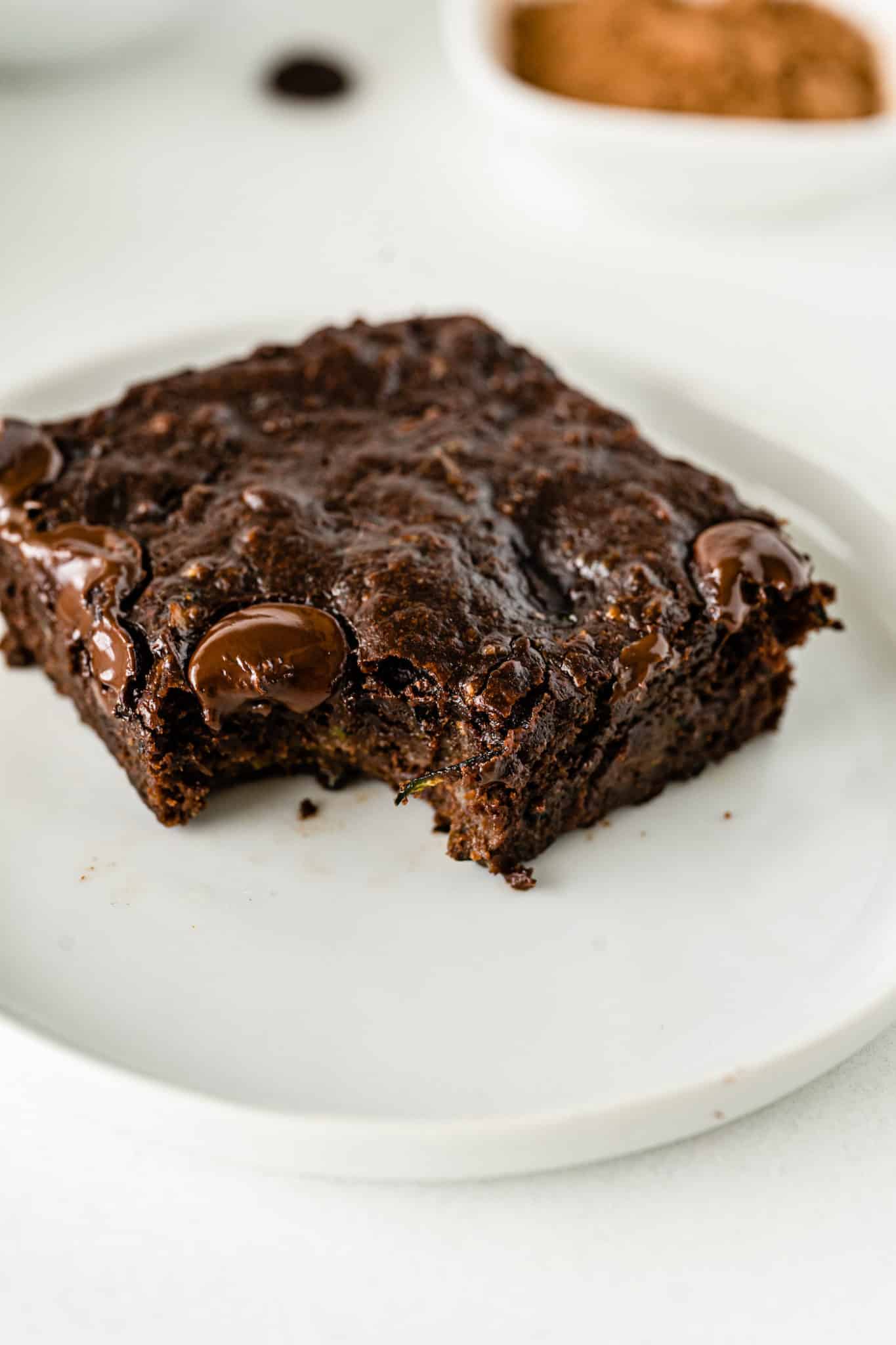 vegan zucchini brownie served on a plate.