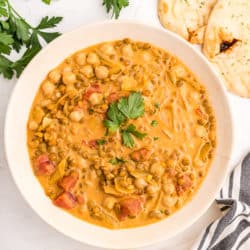 chickpea lentil curry served in white bowl