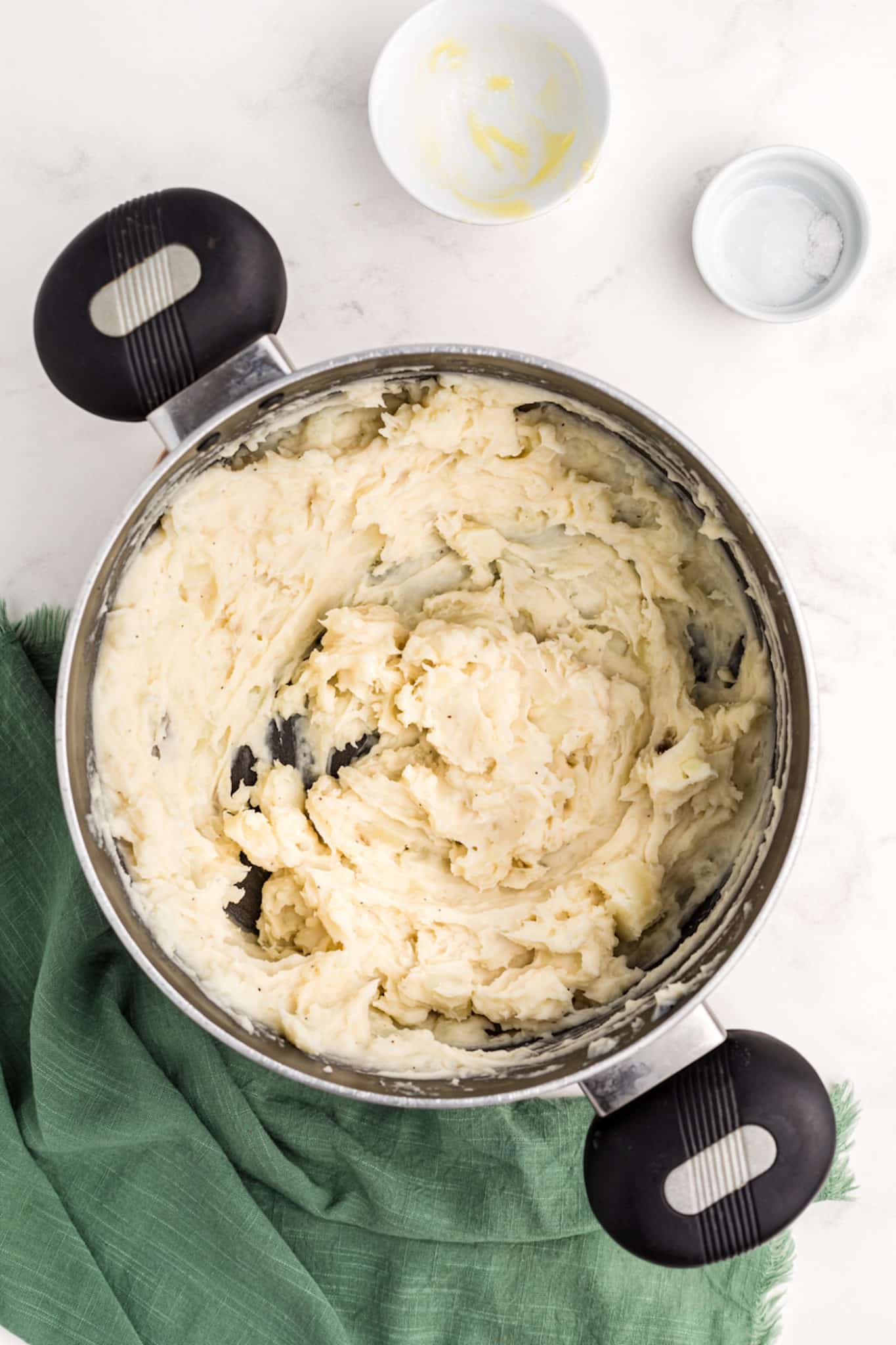 cooked and mashed potatoes in a pot.