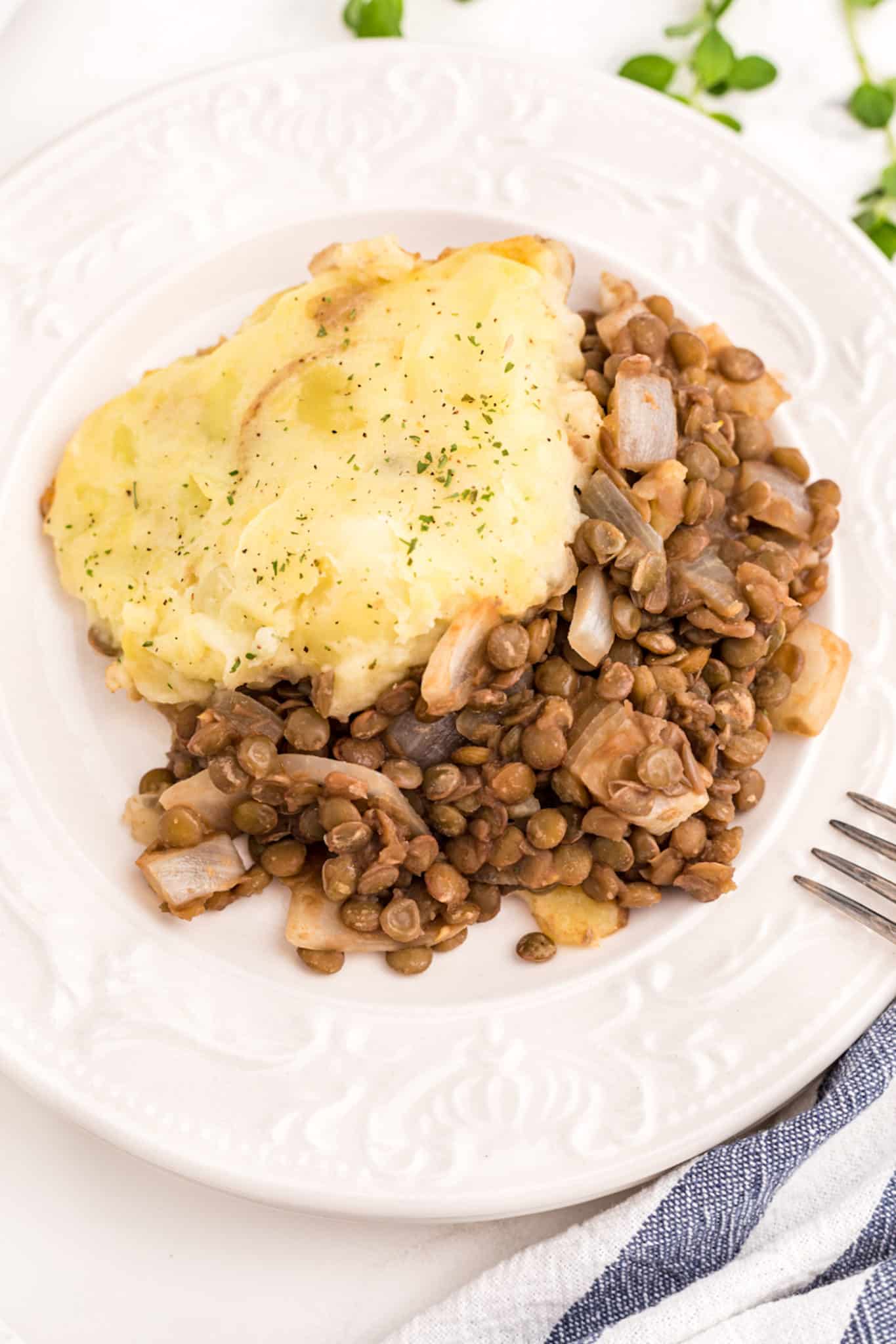 mashed potatoes with lentils on a plate