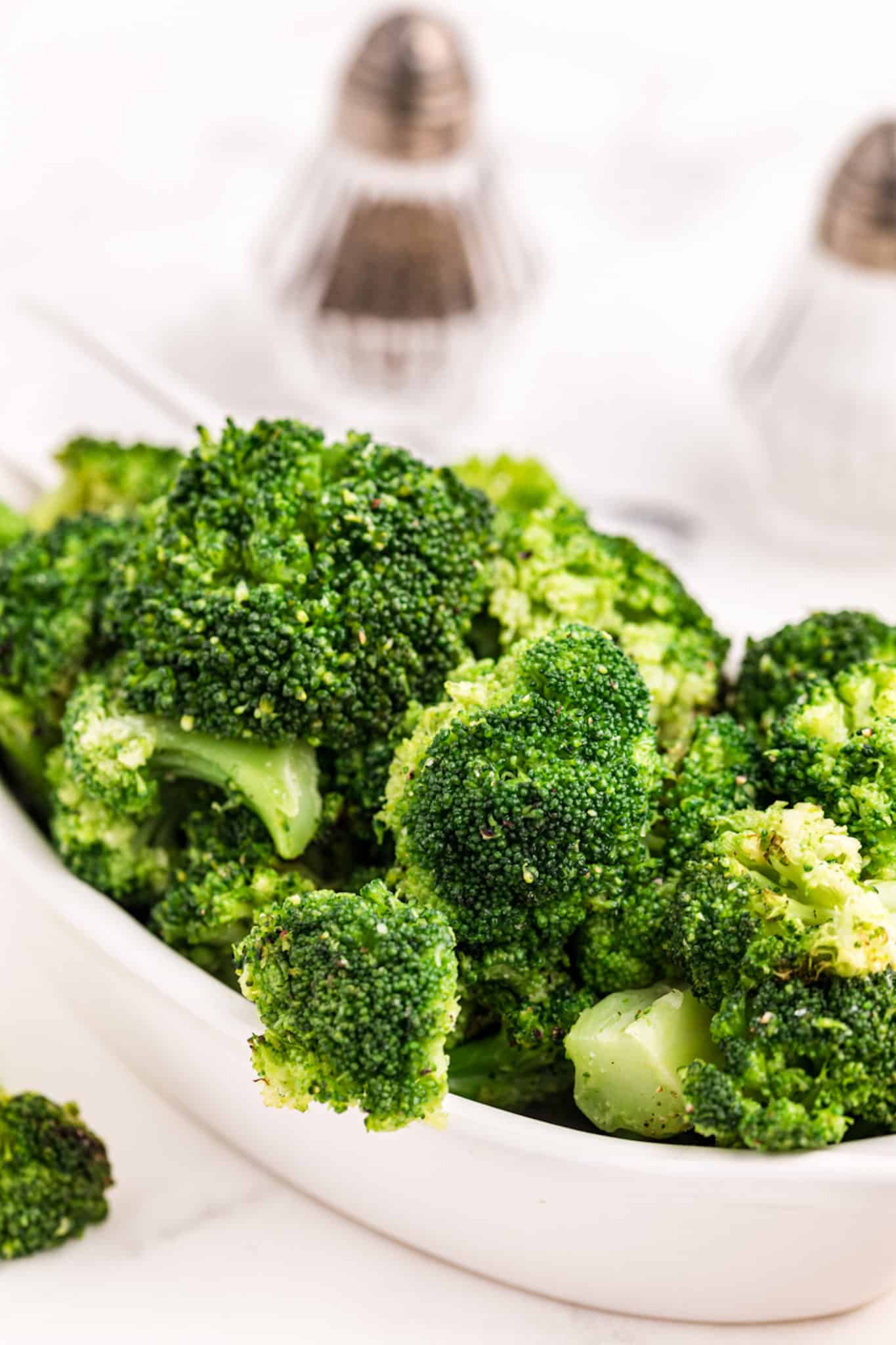serving bowl with steamed broccoli.