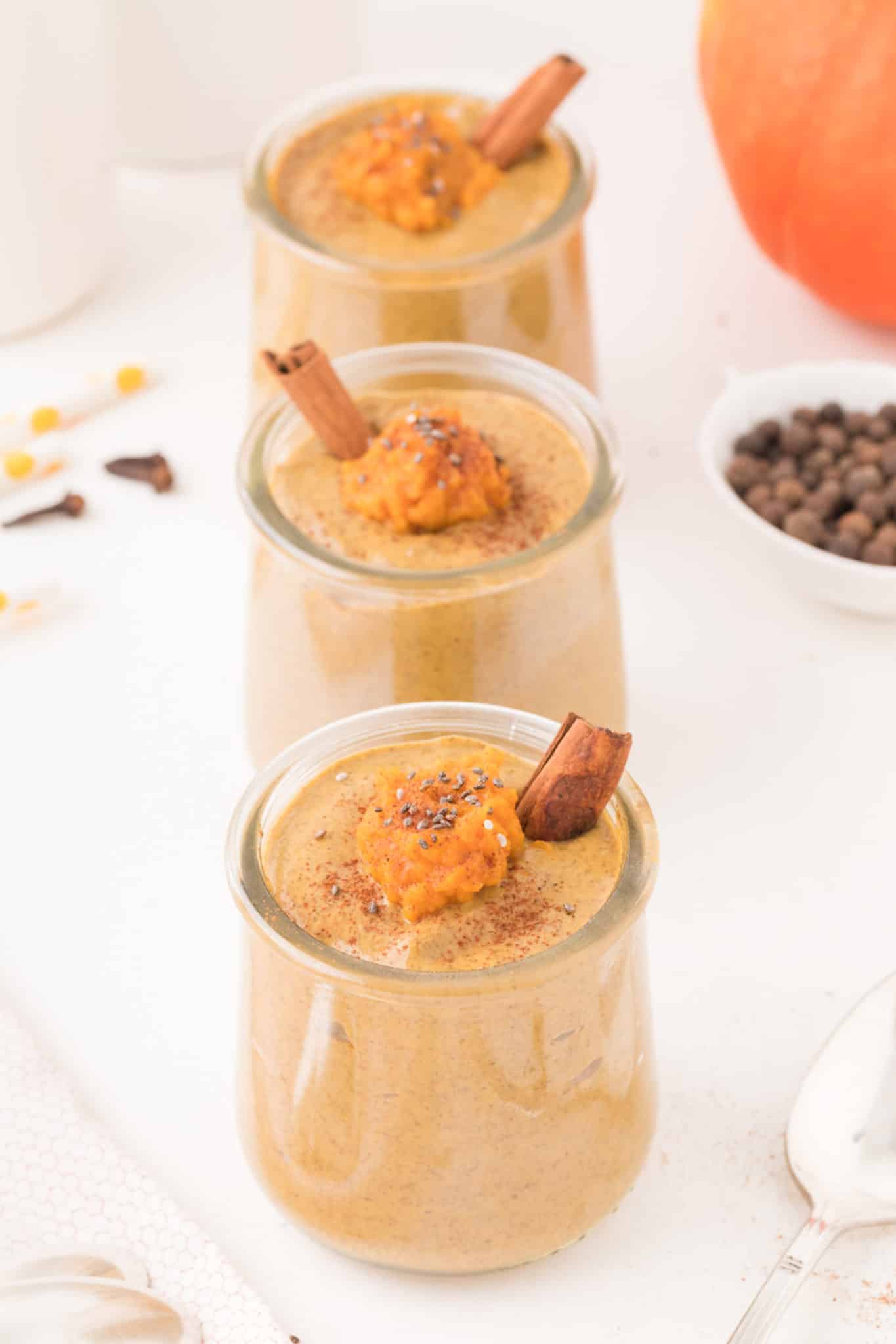 three jars of pumpkin chia pudding.