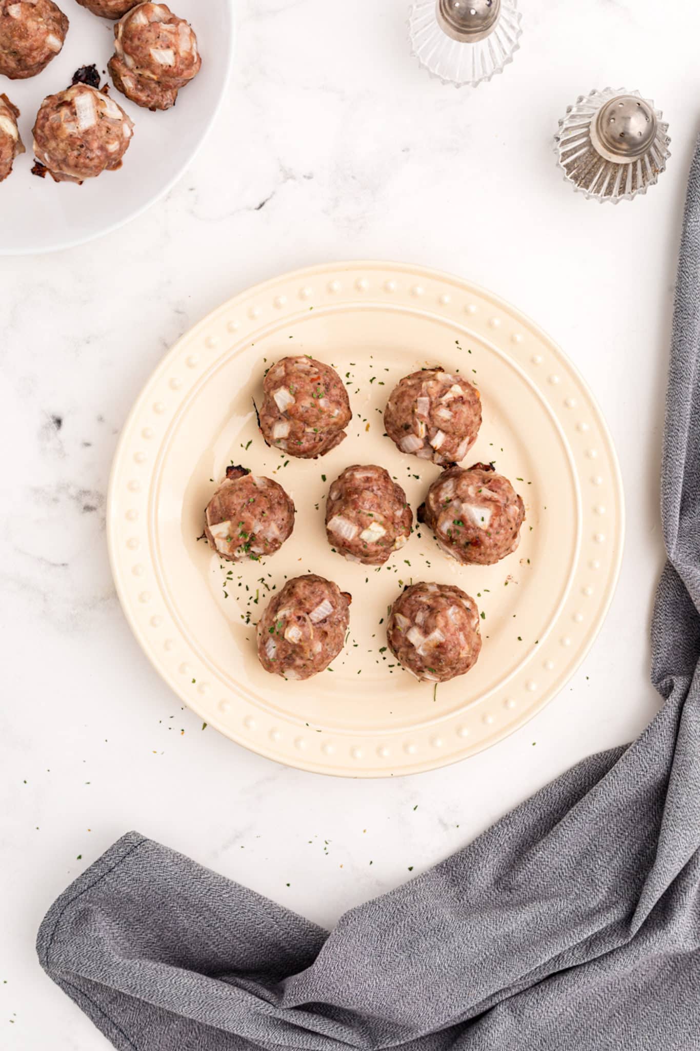 two plates with meatballs