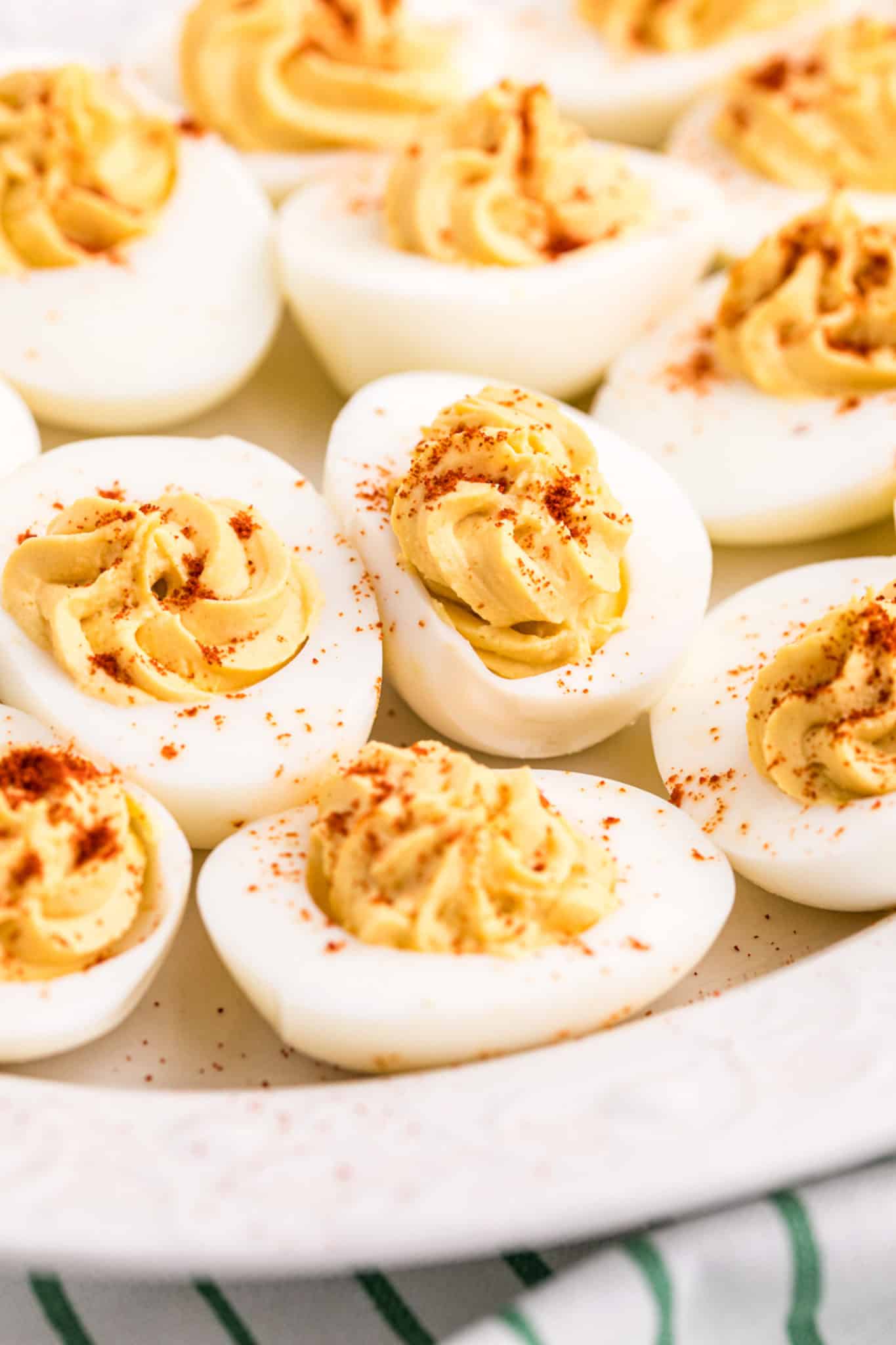 keto deviled eggs sprinkled with paprika.