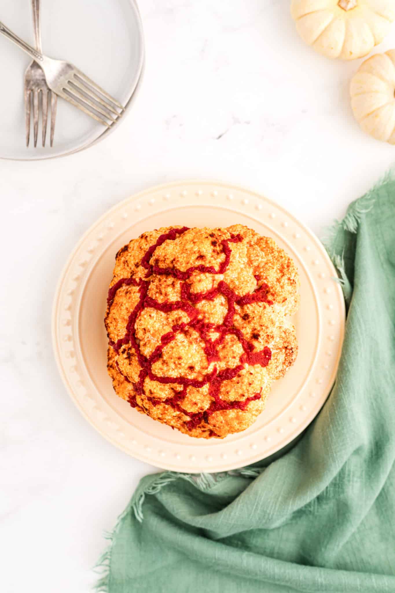 roasted cauliflower brain on a plate.