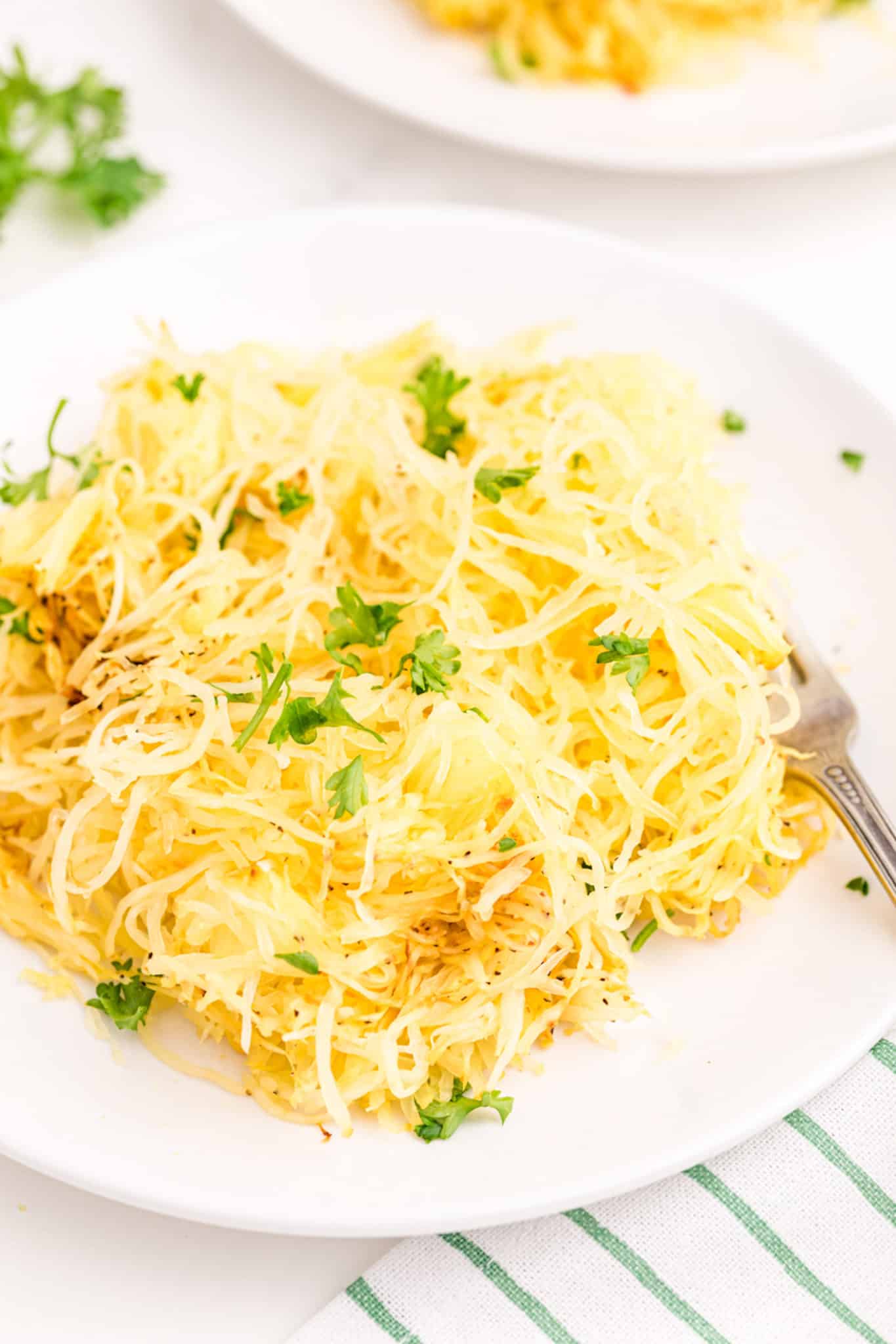 plate of cooked spaghetti squash noodles