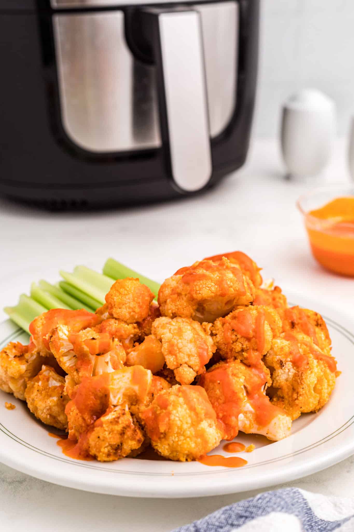 air fryer buffalo cauliflower on a plate