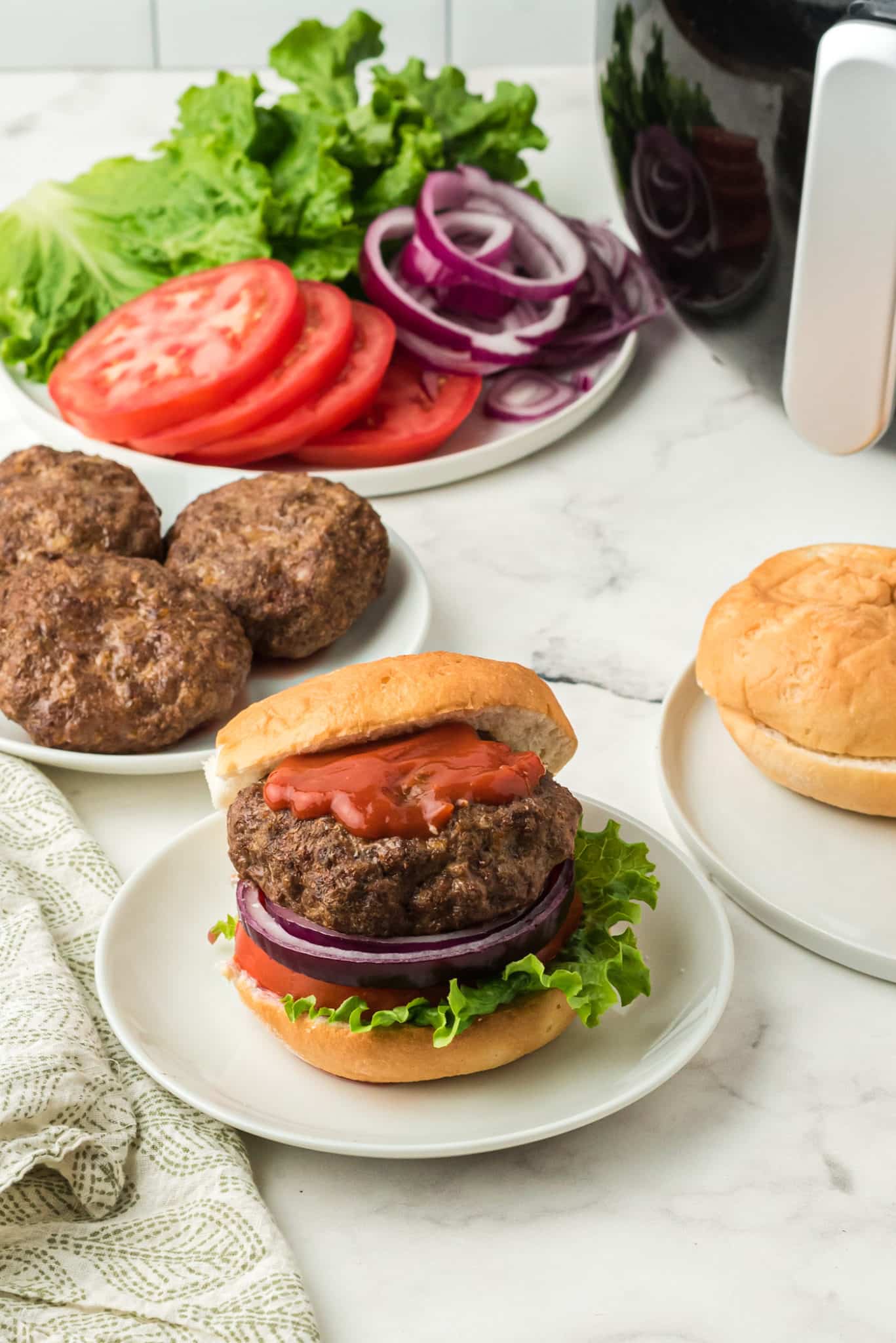 air fried hamburgers with all the fixings.