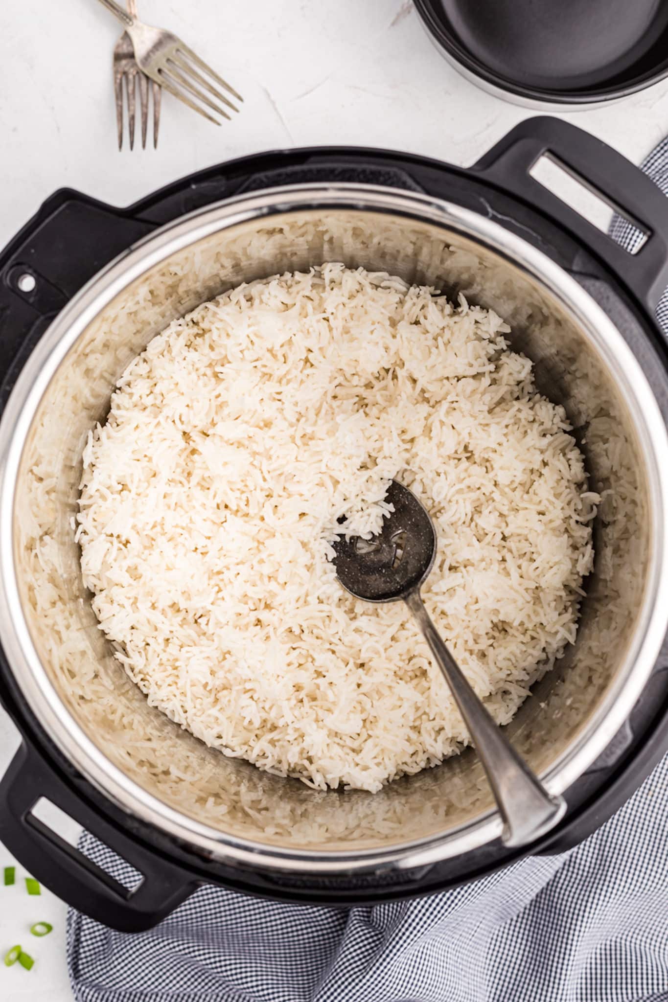 cooked white rice inside of a pressure cooker