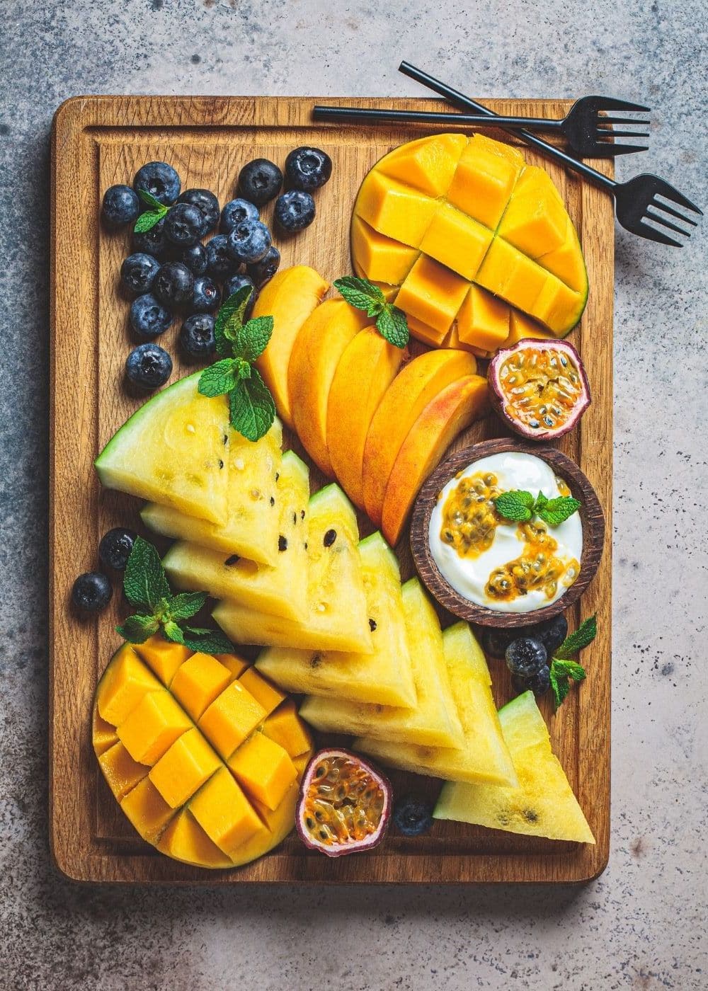 fruit snack board with fresh fruits.