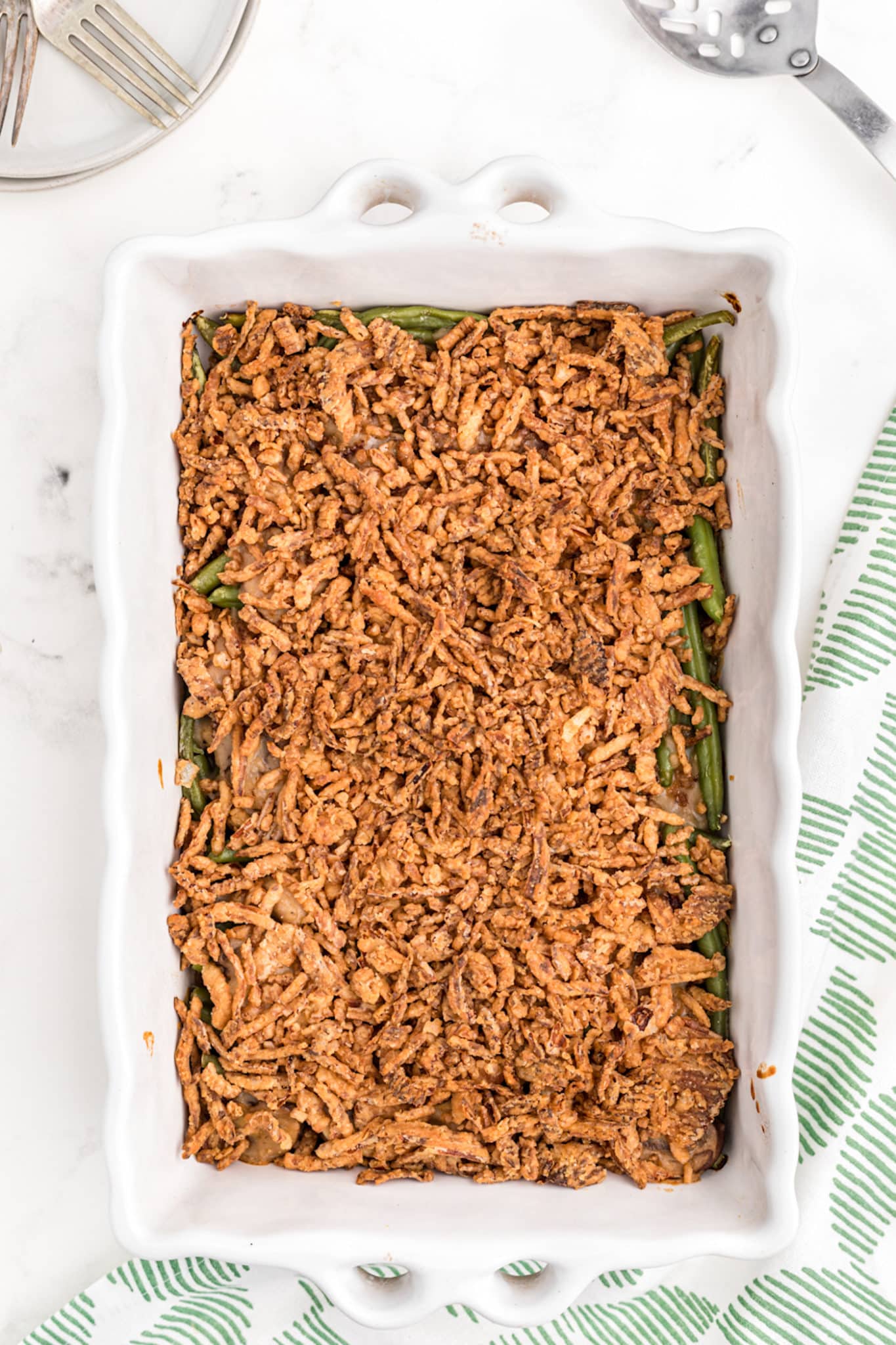 dairy-free green bean casserole baked in dish.